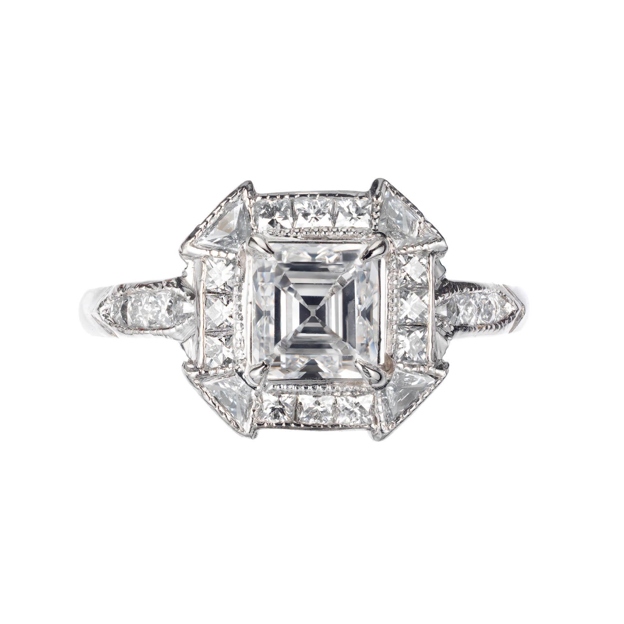 Peter Suchy Asscher cut diamond engagement ring. Platinum setting. Center diamond is an original 1920’s Asscher cut diamond with exceptional sparkle. GIA certified.

1 Asscher cut diamond D VS2. Approximate 1.21 carats. GIA certificate #