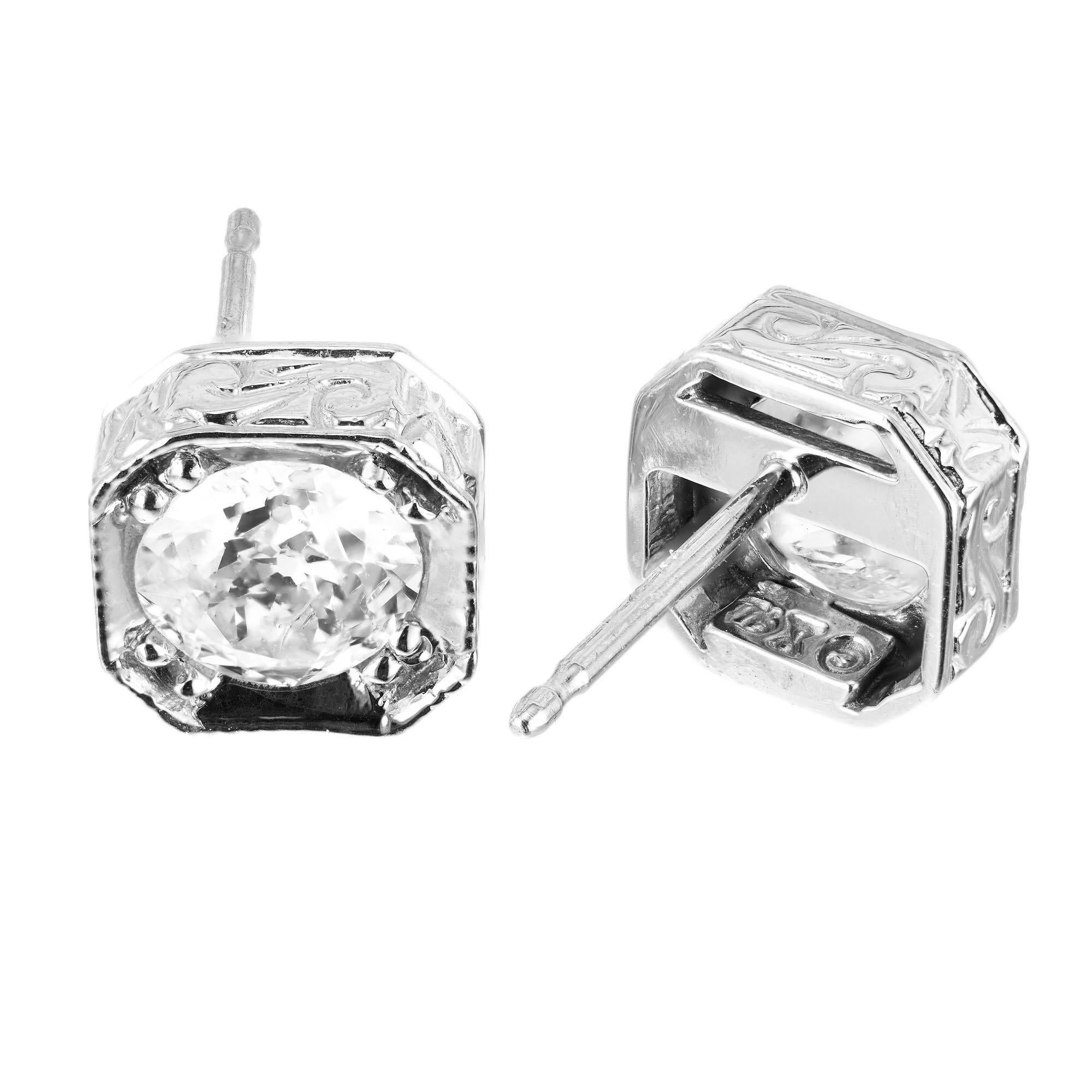 1.22ct diamond stud earrings, set in 18k vintage 8 sided settings with engraved sides. Crafted in the Peter Suchy Workshop

2 round diamonds approx total weight: 1.22cts I, SI2
18k white gold
2.6 grams
