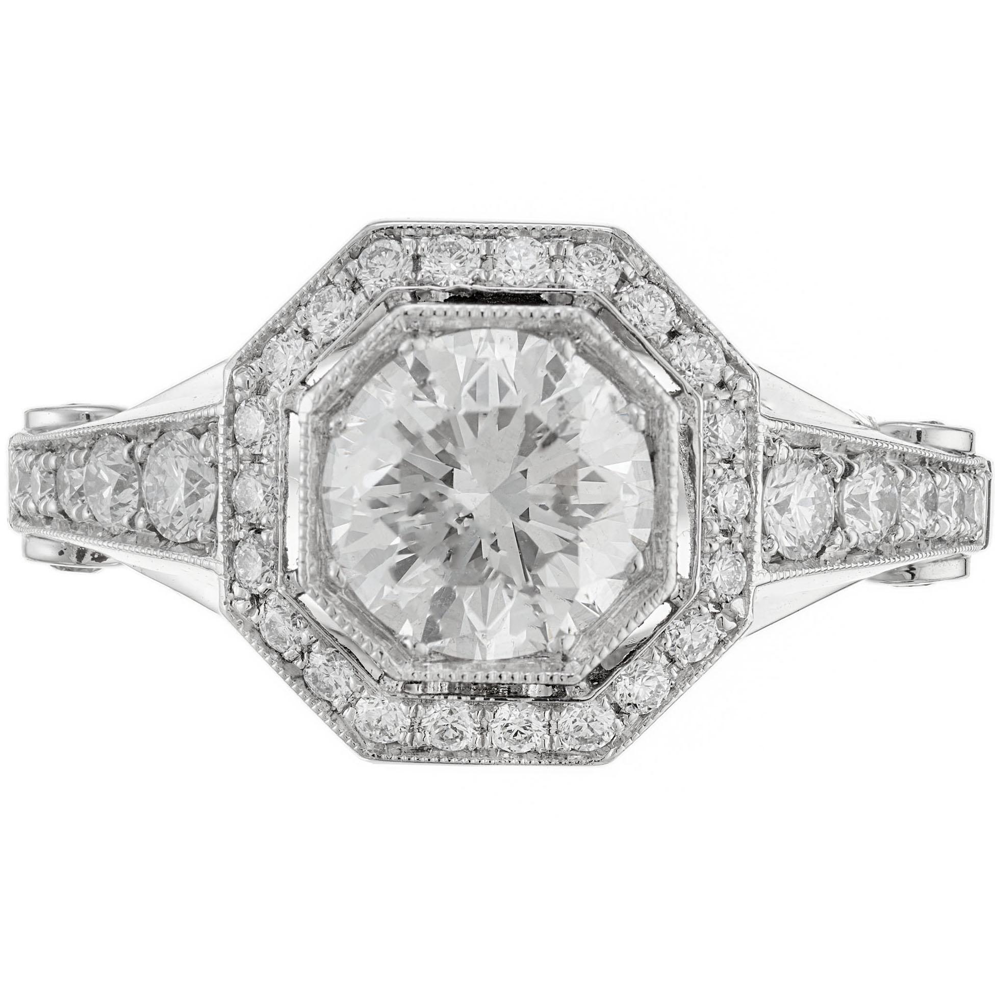 Diamond engagement ring. 1.23ct Round ideal cut center stone with octagonal shaped diamond halo in a platinum setting with round accent diamonds along both sides of the shoulders. EGL certified. Created in the Peter Suchy Workshop.

1 Ideal  Round
