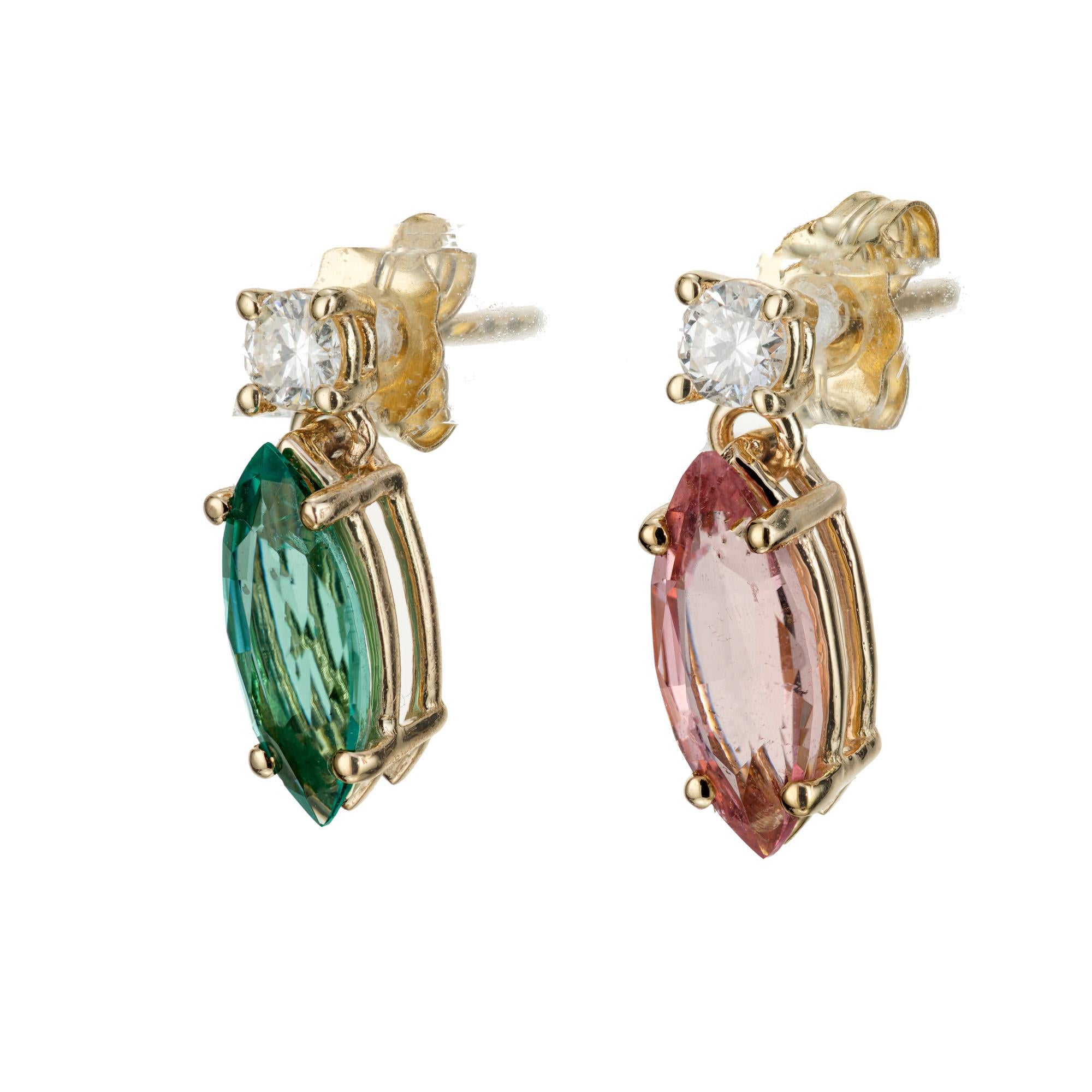 One of a kind dangle earrings with pink and green marquise tourmaline with diamonds tops.  Designed and crafted in the Peter Suchy workshop.

1 marquise cut pink tourmaline
1 marquise cut bluish green tourmaline 
Tourmaline total carat weight,