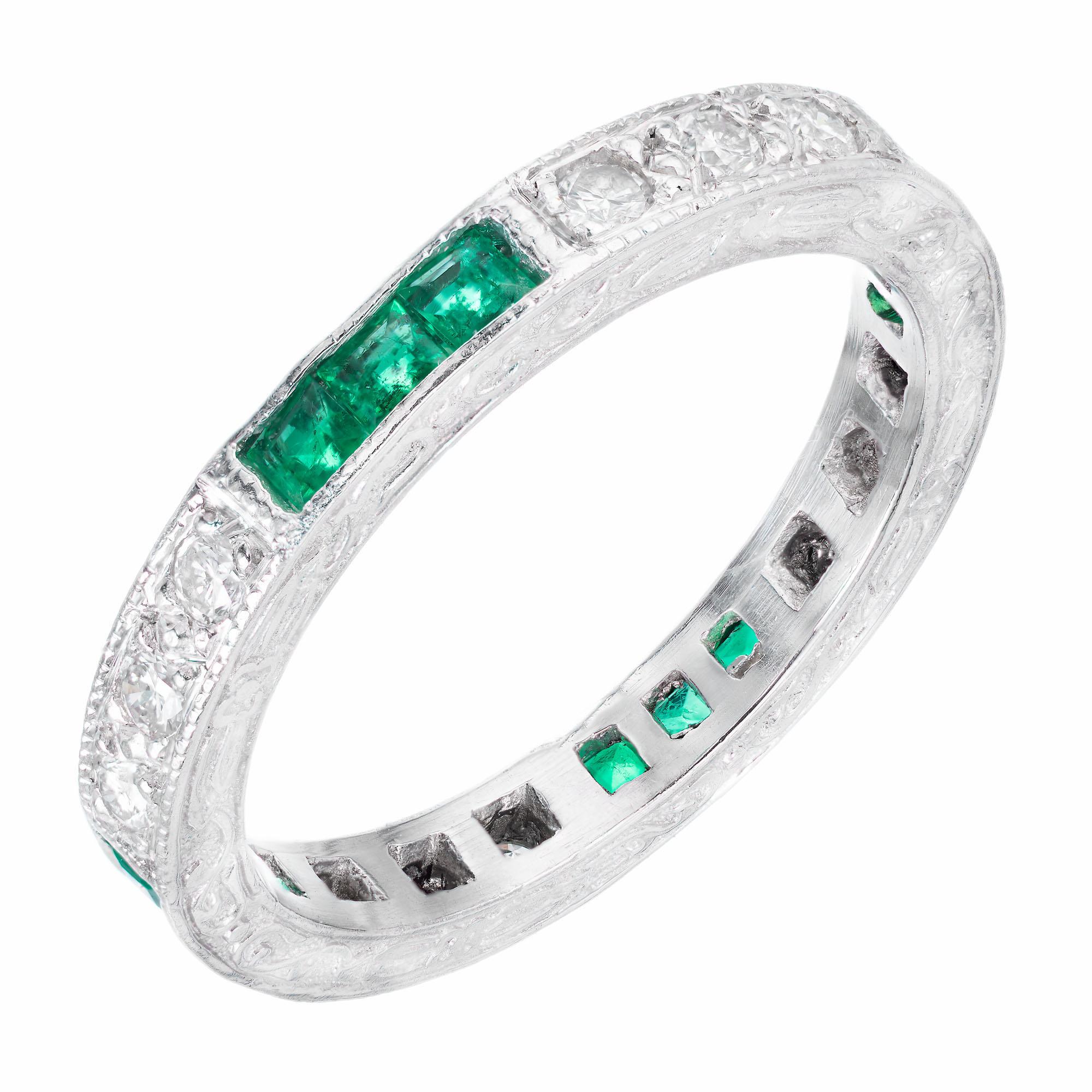 Antique style Platinum Eternity band with engraved sides, bead set round Diamonds with channel set millgrain square Emeralds. Created in the Peter Suchy Jewelers.

12 square bright green Emeralds, approx. total weight 1.40cts, MI, 2mm
12 round