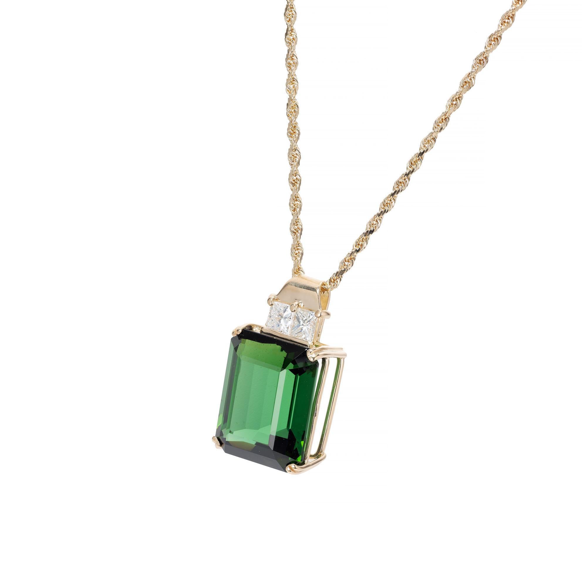 Bright green 14.03 carat emerald cut tourmaline and princess cut diamond pendant on an 18k yellow gold chain. Mad in the Peter Suchy Workshop

1 octagonal cut green tourmaline VS-SI, approx. 14.03cts 
2 princess cut diamonds I-J VS, approx.