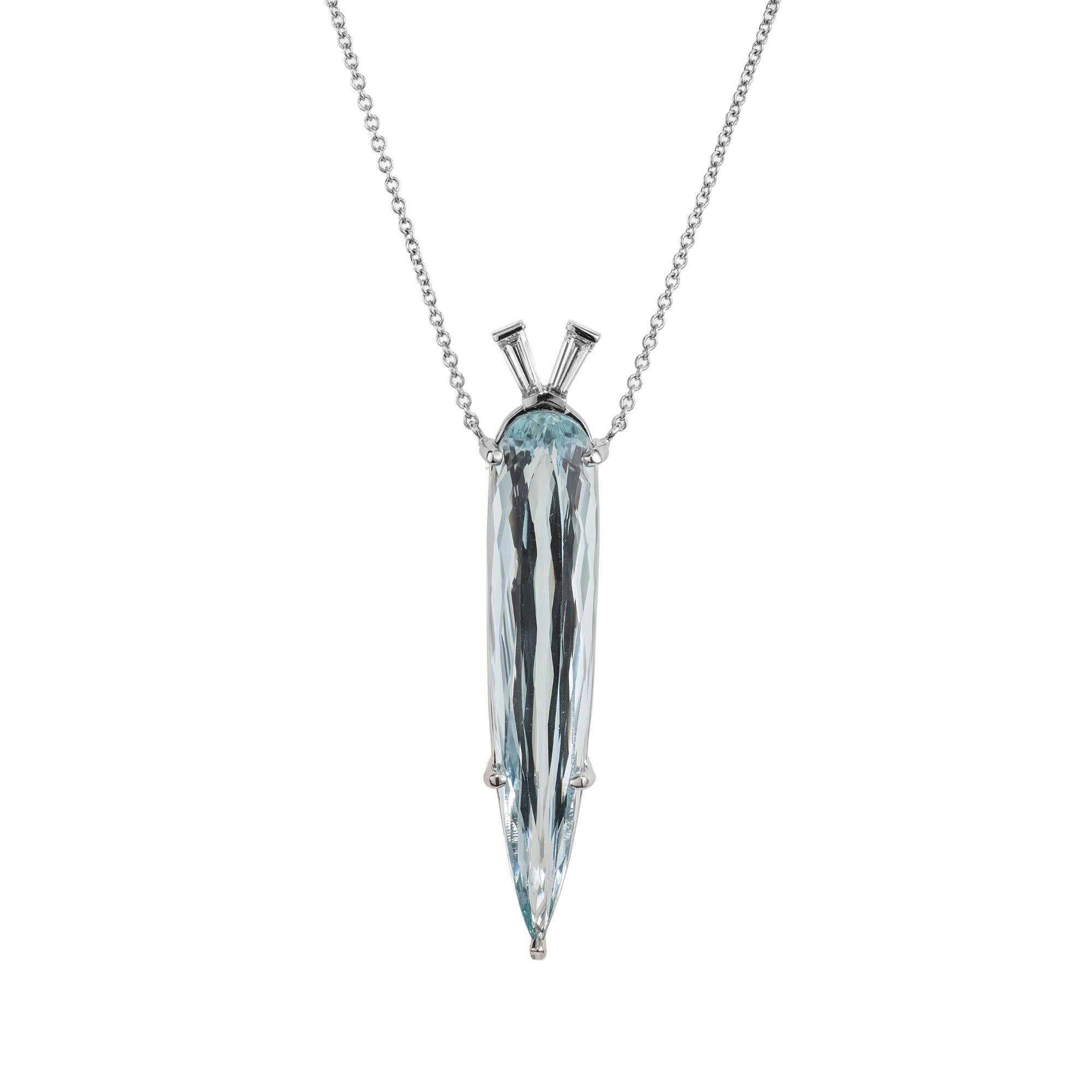 Spectacular 15.31 carat elongated pear shape aqua from an early 1900's estate, made into a one of a kind pendant with tow tapered baguette diamond accents. Brand new setting and simple cable chain allow the pendant to be worn 18 or 16 Inches long.