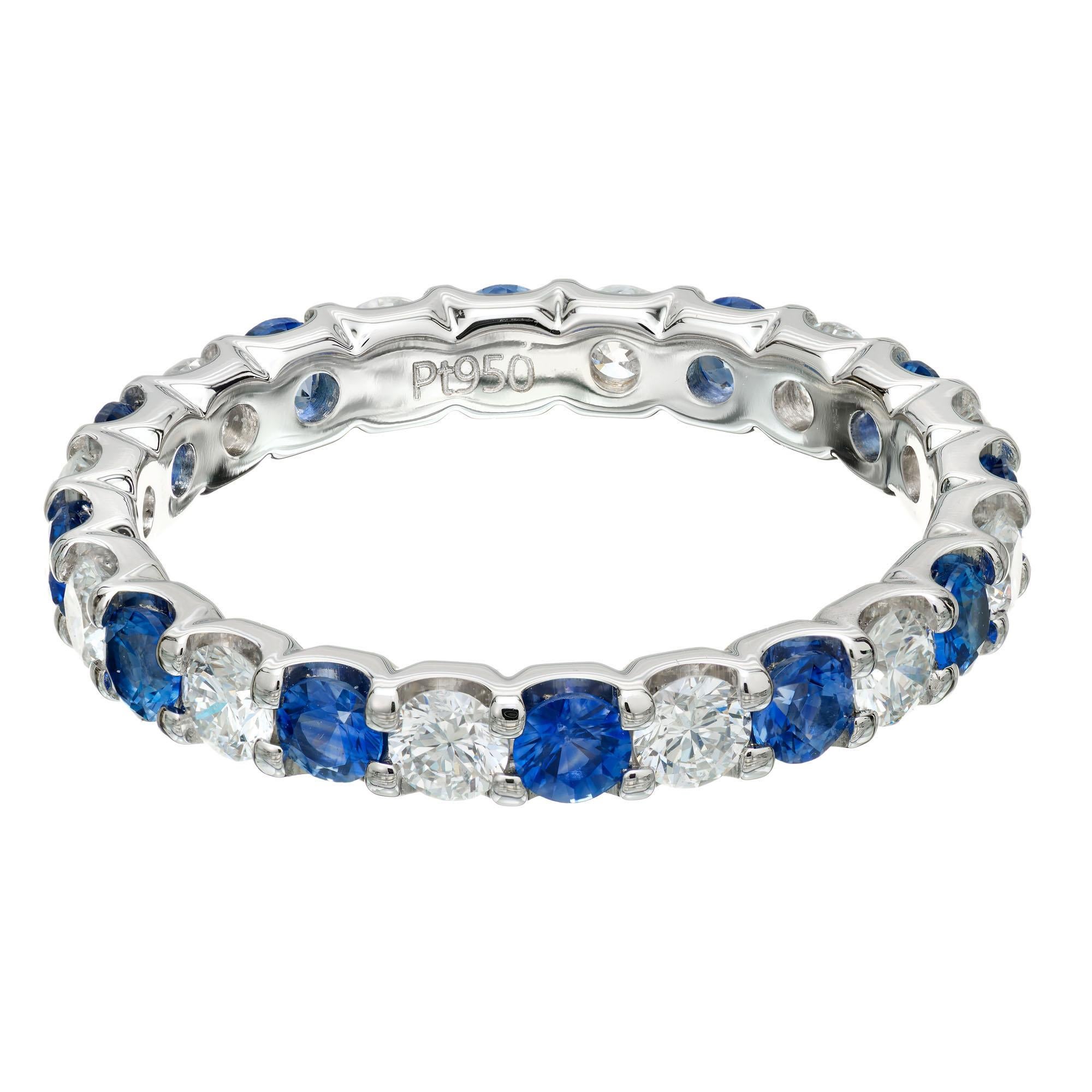 Blue Ceylon sapphire and Ideal cut diamond eternity wedding band ring. 12 round sapphires and 12 round diamonds in a low set common prong setting. Designed and crafted in the Peter Suchy workshop. May be ordered in any stone or ring size

12 round