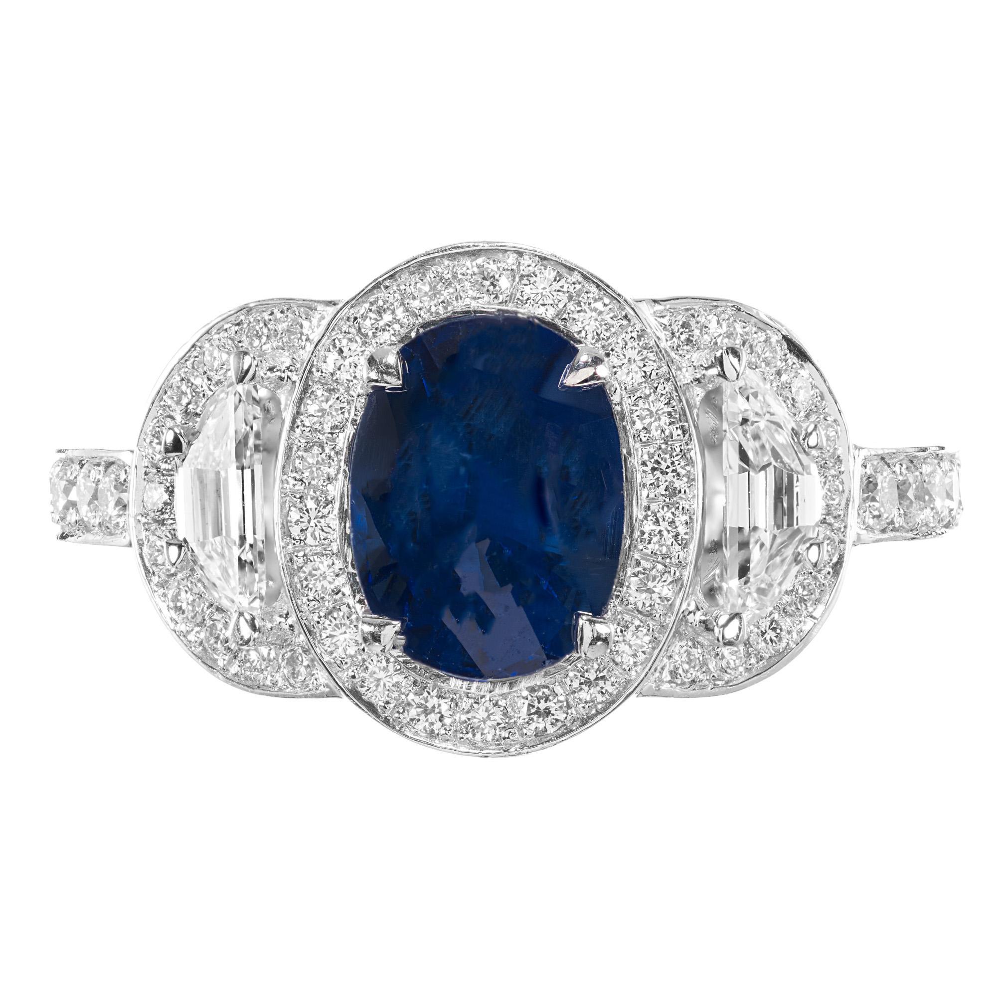 Spectacular sapphire and diamond triple halo engagement ring. Stunning 1.89 carat GIA certified oval center sapphire with 2 old step cut half moons side diamonds set in a platinum custom setting. Both shoulders are set with 5 round diamonds. This