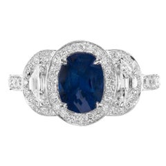 Peter Suchy Anello di fidanzamento in platino con zaffiro e diamante aureolato da 1,89 carati