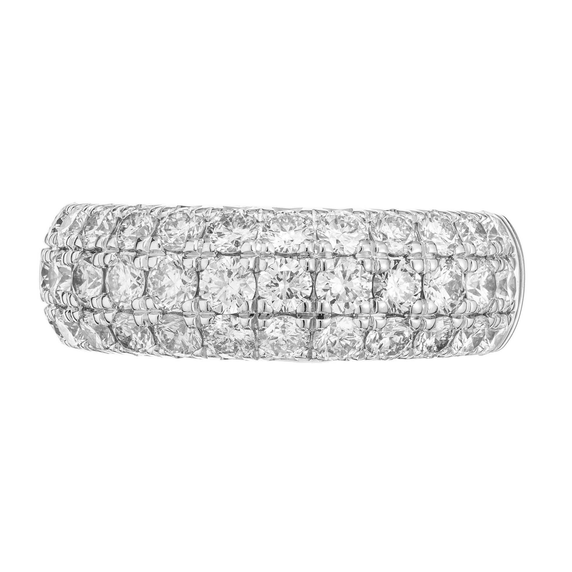 Diamond band ring. This ring boasts of 3 rows of round brilliant cut diamonds in a 14k white gold setting. 39 diamonds with an approximate total of 2.00 carats. The diamonds are bright with great brilliance that go half way across the ring. Designed