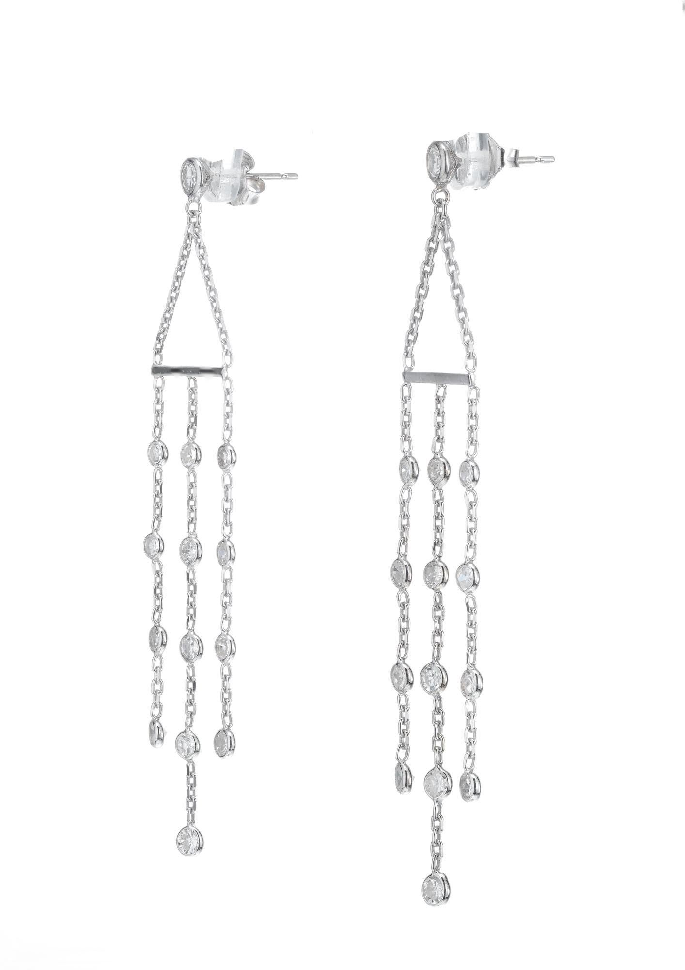 Diamond dangle chandelier earrings. Vintage style in 14k white gold with 28 round full cut diamonds. Created in the Peter Suchy Workshop.

2 round full cut diamonds, approx. total weight .24cts, H-I, VS1 to SI1
26 round full cut diamonds, approx.