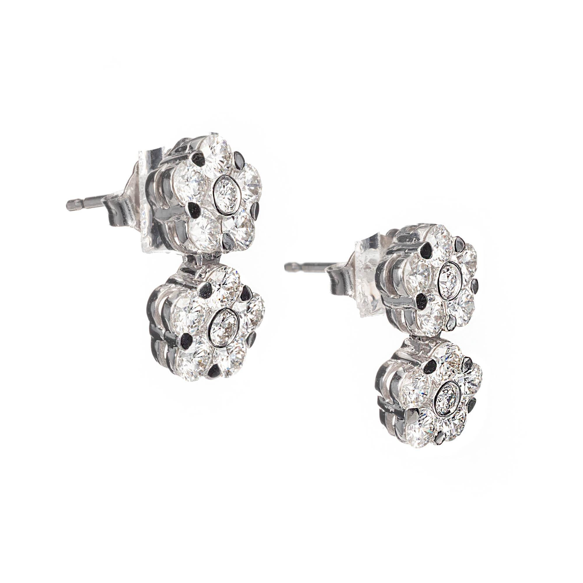 Peter Suchy double cluster 2.12ct diamond dangle earrings in 18k white gold 

24 round brilliant cut F-G VS diamonds, Approx. 2.12 carats
18k White Gold 
Stamped: 18k
3.4 Grams
Top to Bottom: 14.2 or .56 Inches
Width: 7.4mm or .30 Inches
Depth or