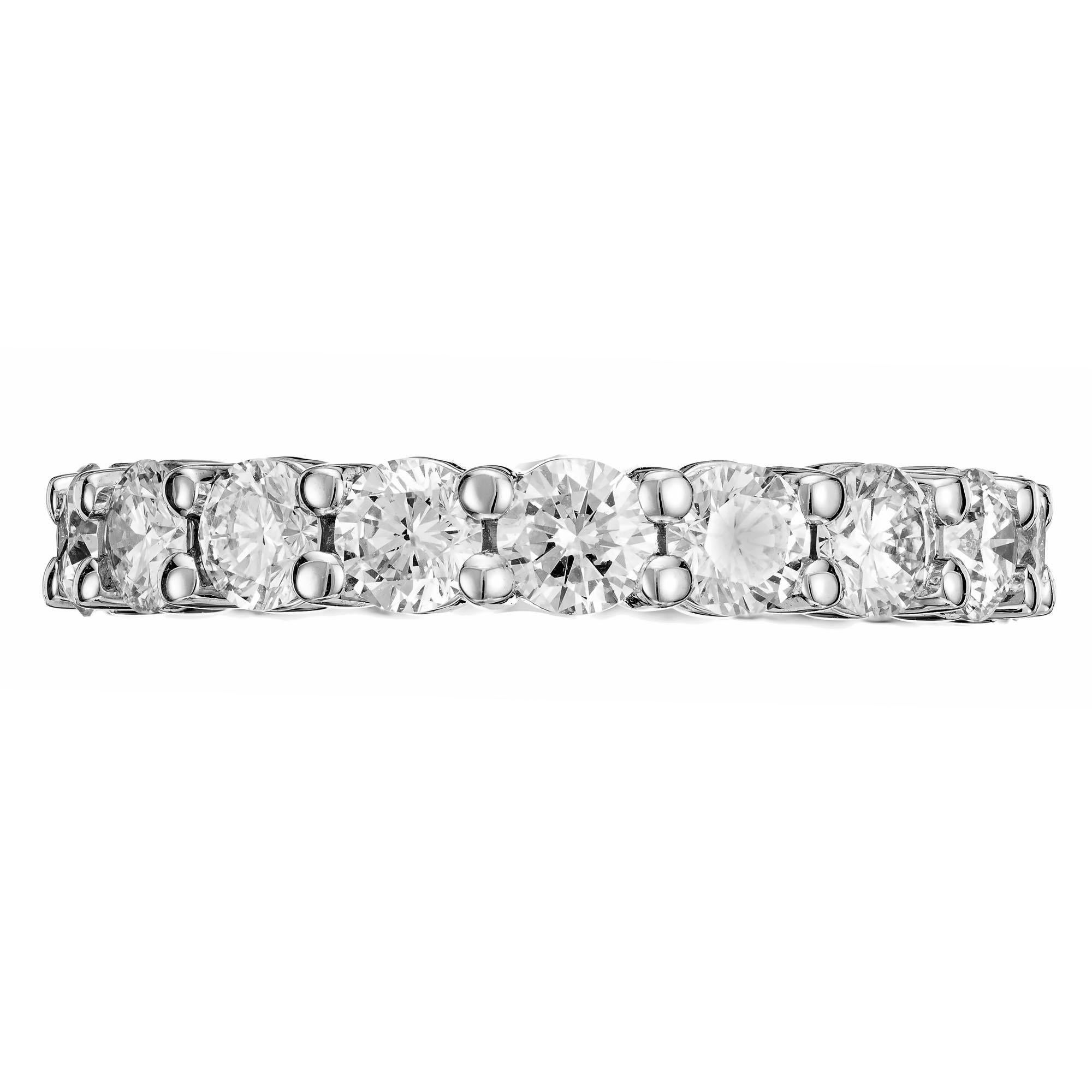 Common prong diamond eternity wedding band ring. 19 round brilliant cut diamonds set in platinum. Size 7 and not sizable. Can be costumed ordered in different sizes. Designed and crafted in the Peter Suchy workshop.

18 round brilliant cut diamonds,