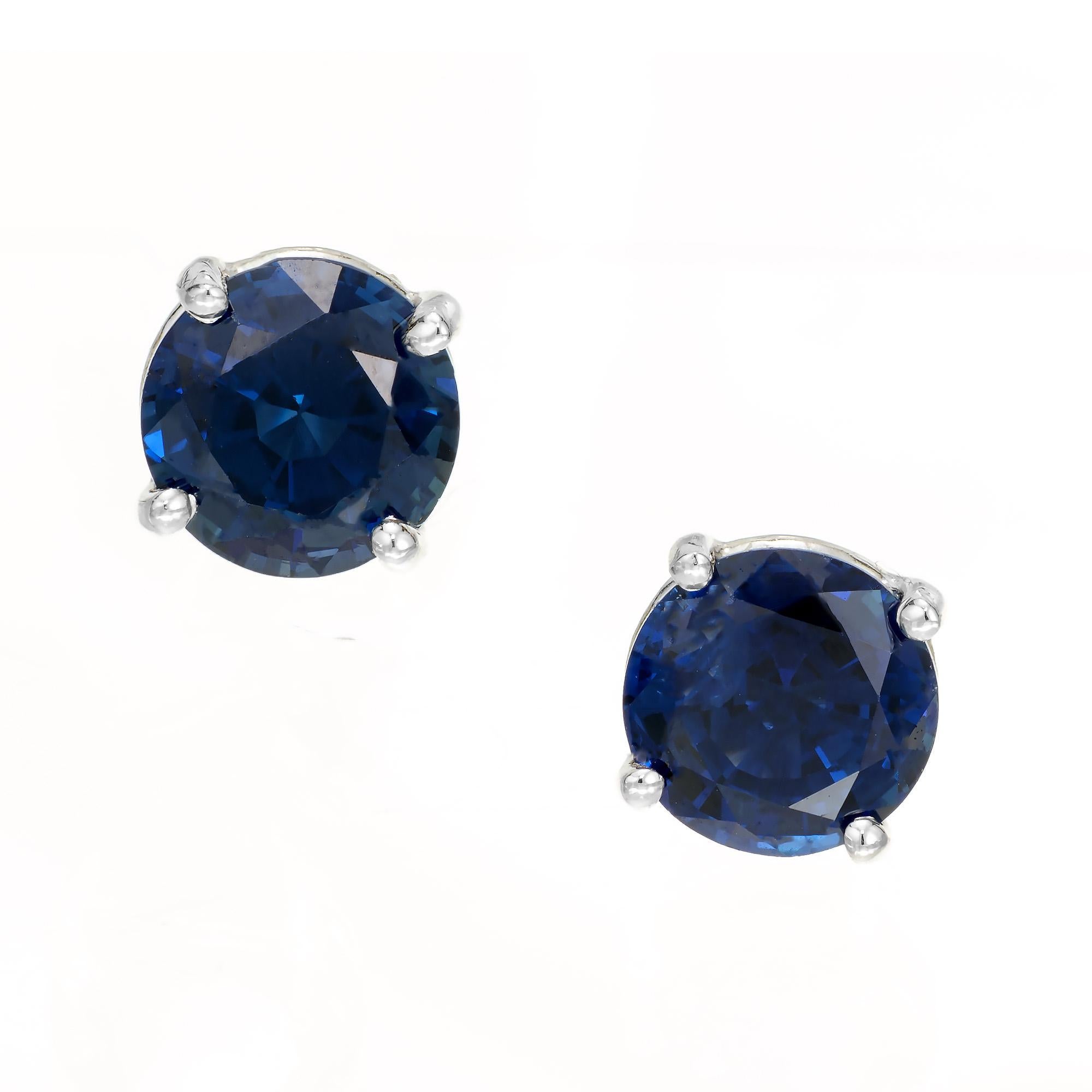 Rich blue round sapphire stud earrings.  2.24 carat round sapphires in a classic platinum 4 prong basket settings. Designed and crafted in the Peter Suchy Workshop.

2 round blue sapphires, SI approx. 2.24cts
Platinum 
1.71 grams
Top to bottom: