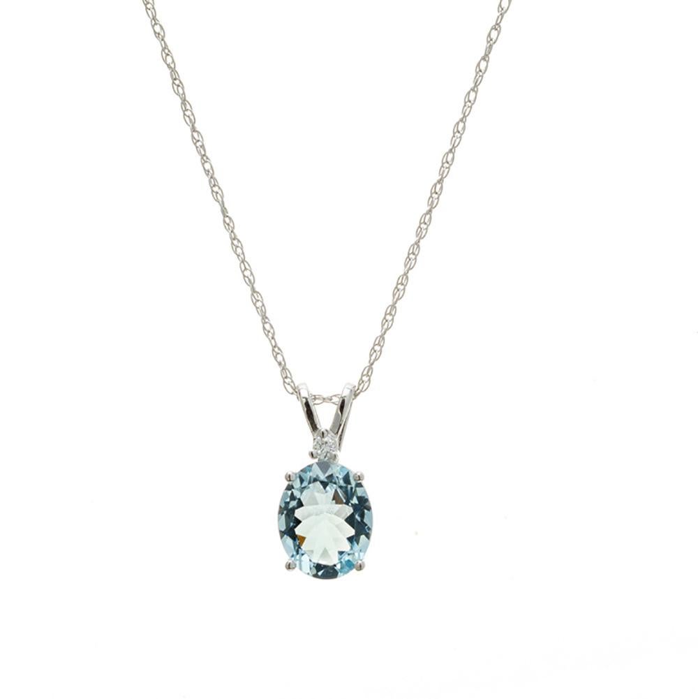 Aqua and diamond pendant. Untreated 2.00 carat oval aquamarine with a round brilliant cut accent diamond set in a four prong 14 white gold setting. 19 inch 14k white gold chain. Designed and crafted  in the Peter Suchy Workshop.

1 oval blue