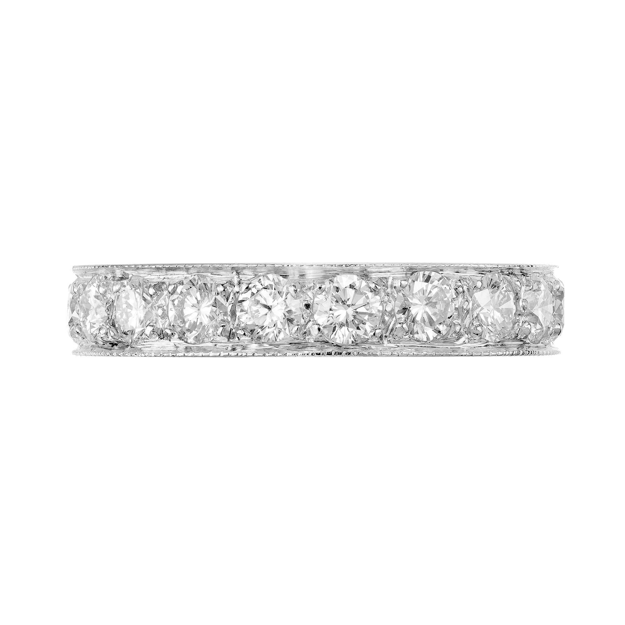 Classic Platinum round diamond, hand bead set wedding band ring. Made in the Peter Suchy Workshop.

19 round brilliant cut diamonds, approx. total weight 2.25cts, F, VVS-VS
Size 6 and not sizable
Platinum
Tested: Platinum
Stamped: Plat
7.8