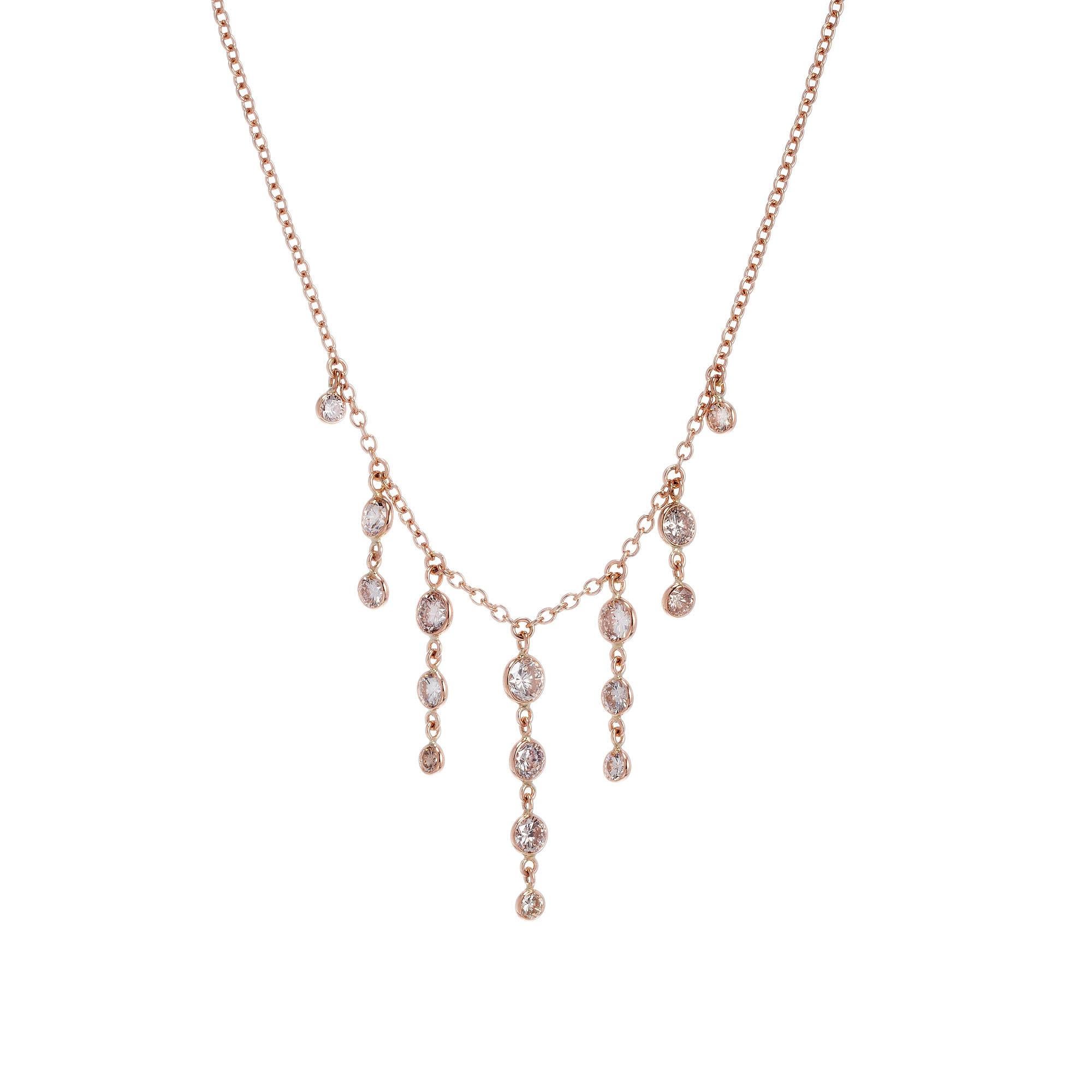 14k rose gold Diamond by the Yard style necklace made with natural slightly pinkish brown estate diamonds in a classic dangle drop pendant design. 18 inches

16 natural light to medium brown full cut diamonds .05ct to .20ct, approx. total weight