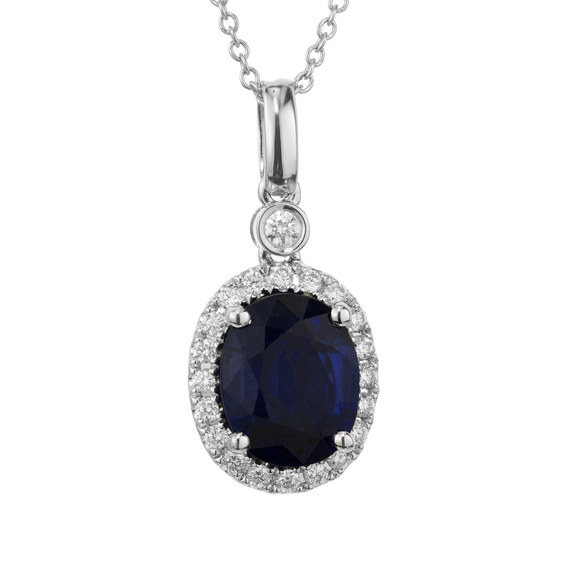 Beautiful blue oval sapphire 2.85cts and diamond halo pendant necklace. The oval shaped deep blue sapphire GIA certified natural sapphire, heated no other enhancements with its origin being from Madagascar. The sapphire has a halo of round brilliant