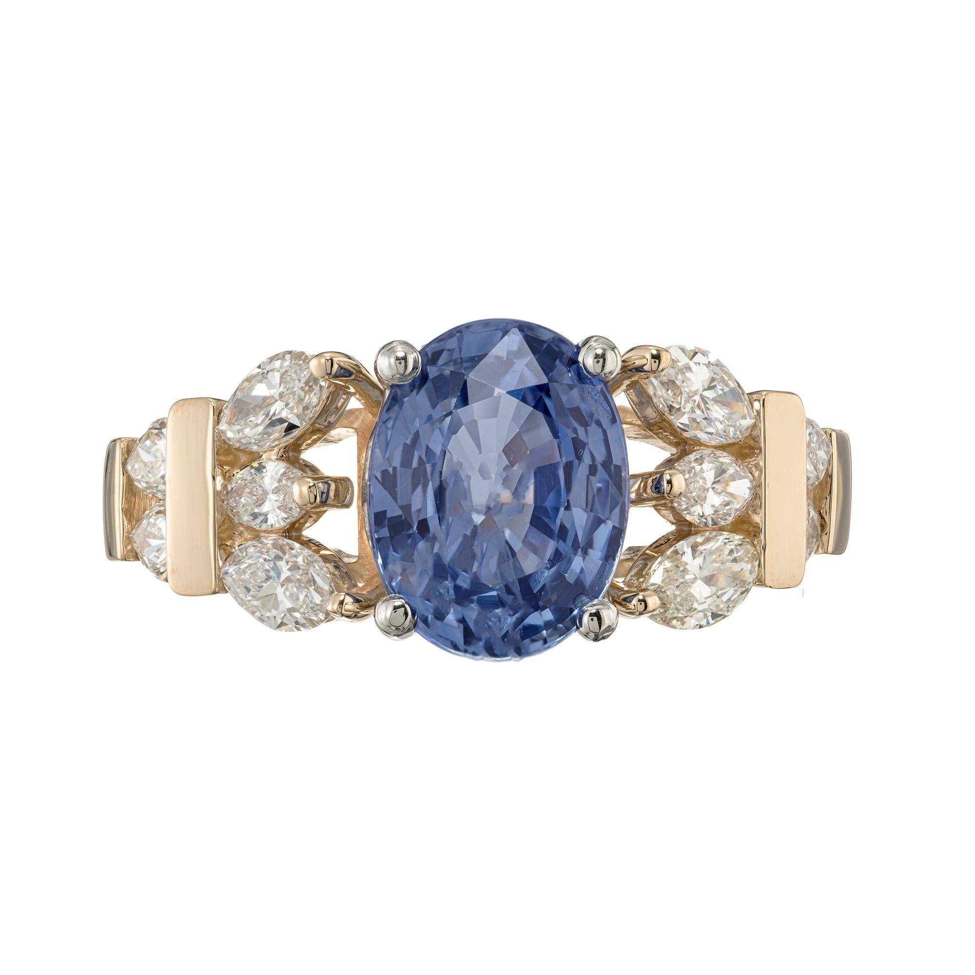 Crafted with meticulous attention to detail, the Peter Suchy periwinkle blue Sapphire Diamond engagement ring exudes elegance and sophistication. Set with a mesmerizing 3.11ct oval blue sapphire, mounted into a platinum four prong crown setting