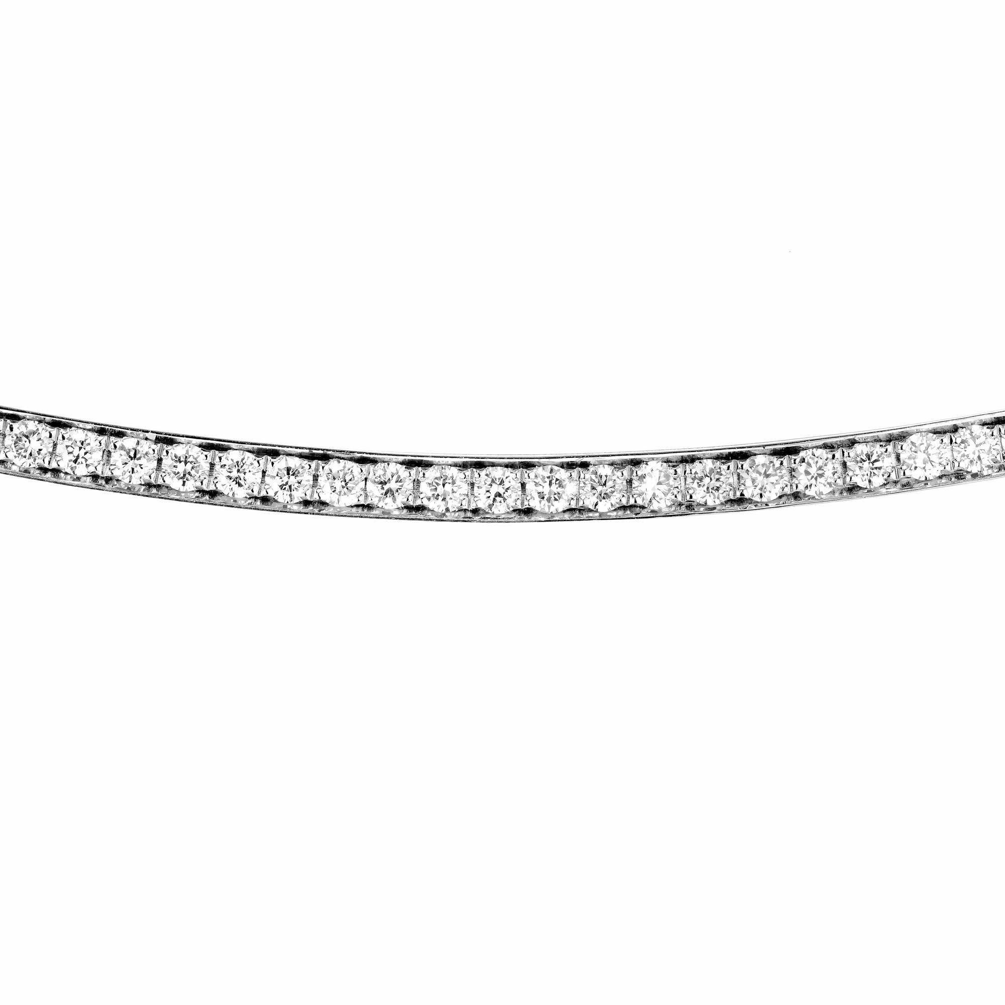 Diamond smile pave set bar necklace. 39 round pave set diamonds totaling .36cts. 18 inch 14k white gold chain. Also available in platinum and yellow gold. Adjustable 16.5 to 18 Inches. Designed and crafted in the Peter Suchy workshop

39 round