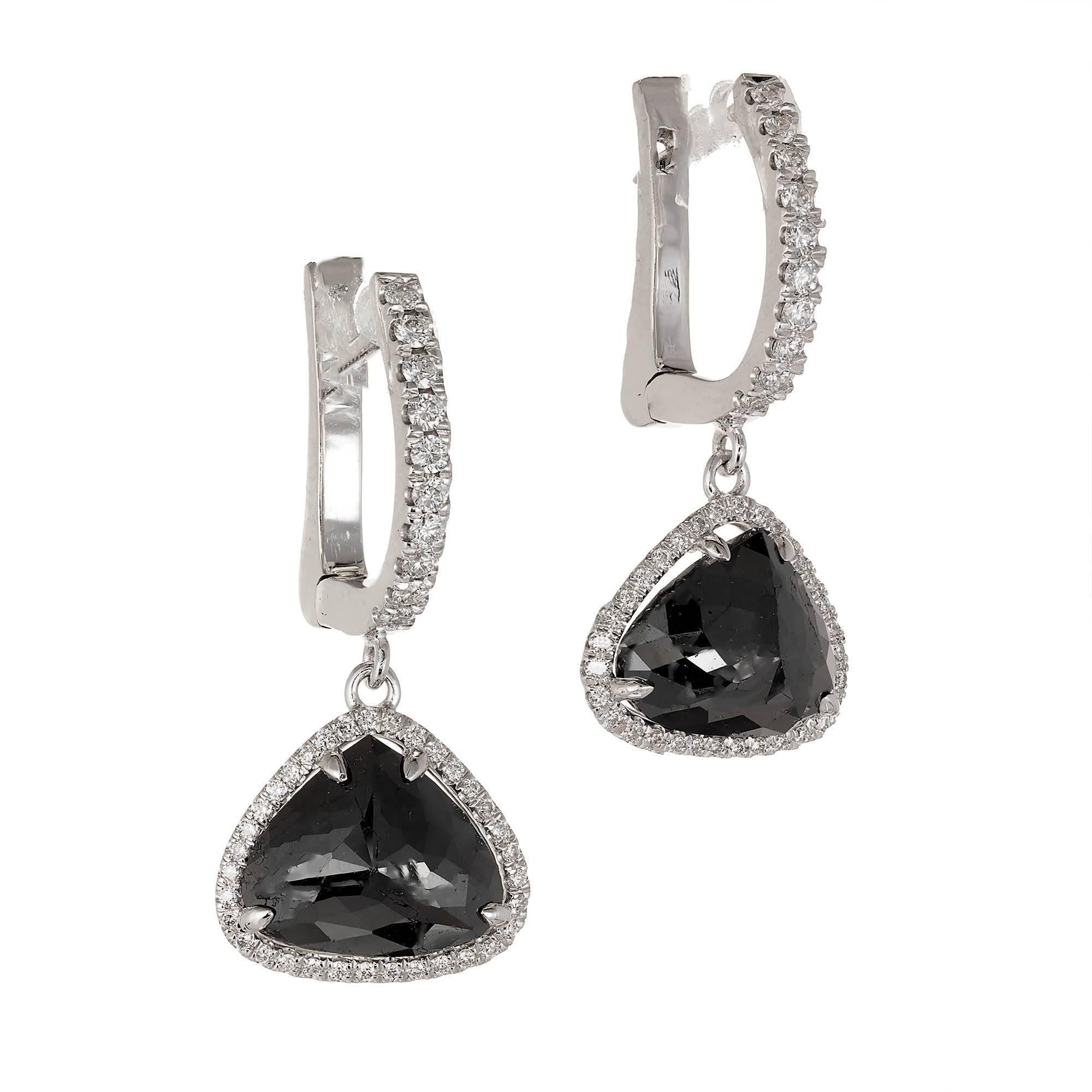 Peter Suchy black diamond halo dangle earrings 3.89cts of modified heart or pear shape. Black Diamonds GIA certified even color treated fancy black. Set in a Diamond dangle halo to form a Diamond hoop in 18k white gold. From the Peter Suchy