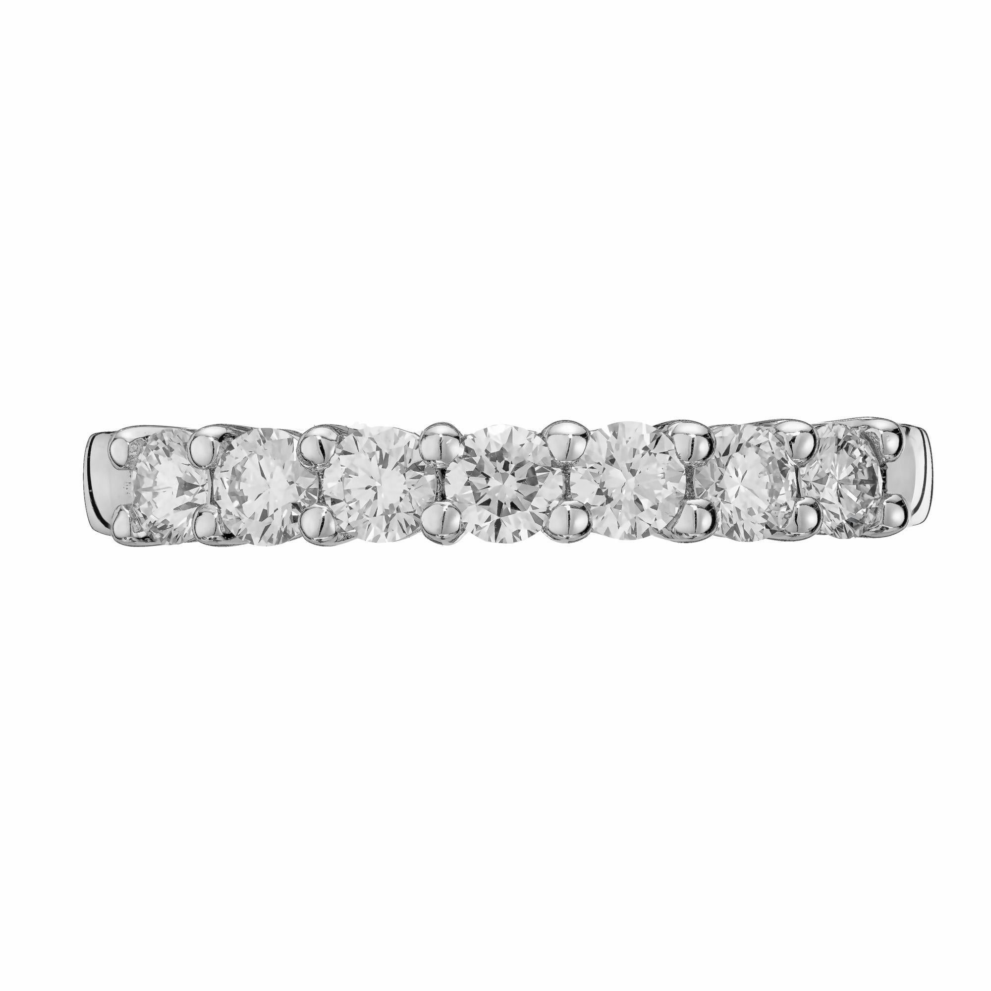 Diamond wedding band ring. Seven round brilliant cut diamonds, set in a platinum common prong setting. Designed and crafted in the Peter Suchy workshop

7 round brilliant cut diamonds, G VS approx. .42cts
Size 5 and sizable 
Platinum 
Stamped: