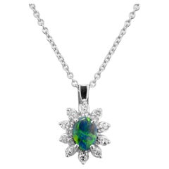 Halskette mit Anhänger aus Weißgold mit43 Karat schwarzem Opal und Diamant in Weißgold von Peter Suchy
