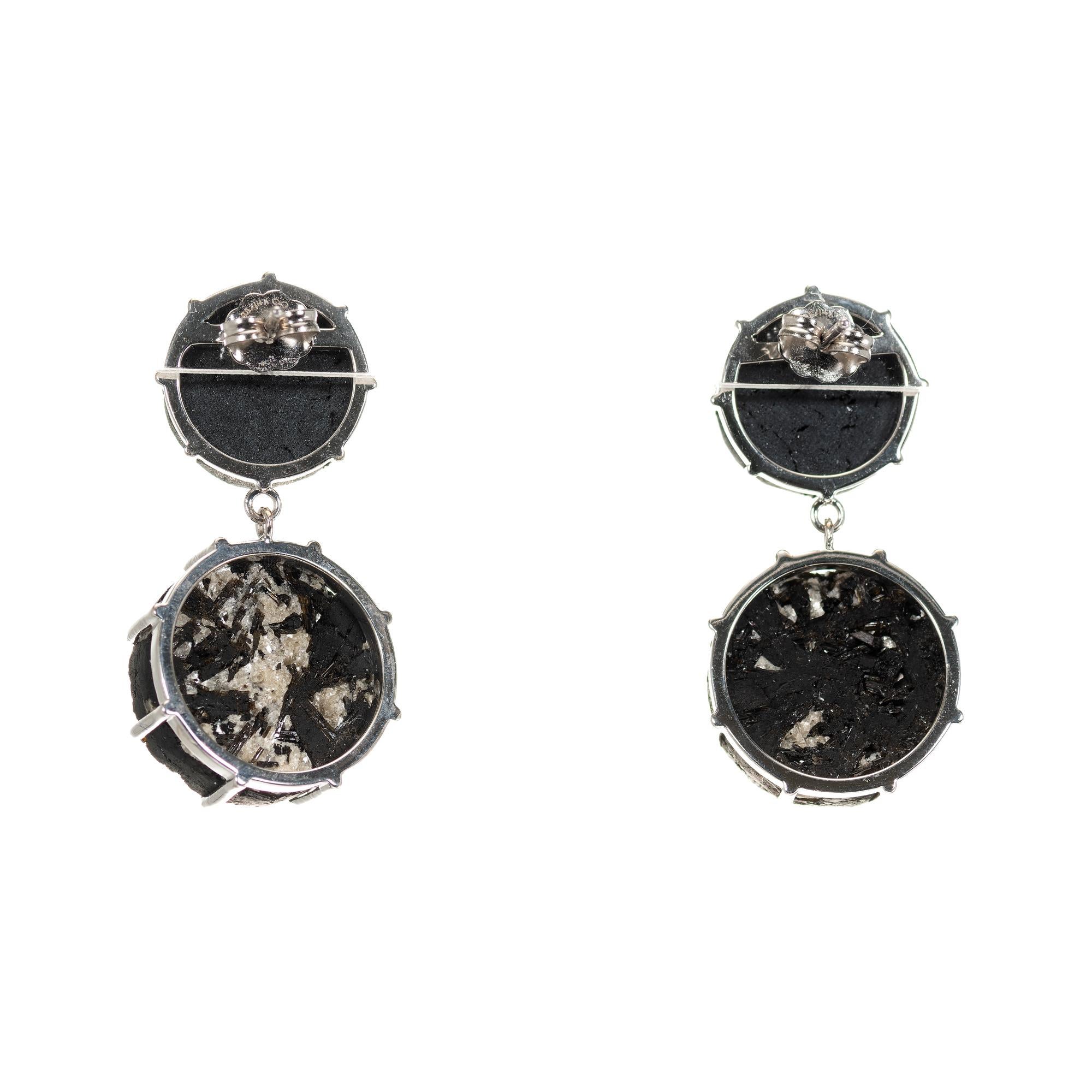 Natural untreated black round tourmaline mineral dangle earrings in 14k white gold. 

2 round black tourmaline, Approximate 16.17cts 
2 round molted gray black tourmaline, Approximate 26.96cts 
14k white gold 
Stamped: 14k
14.6 grams
Top to Bottom: