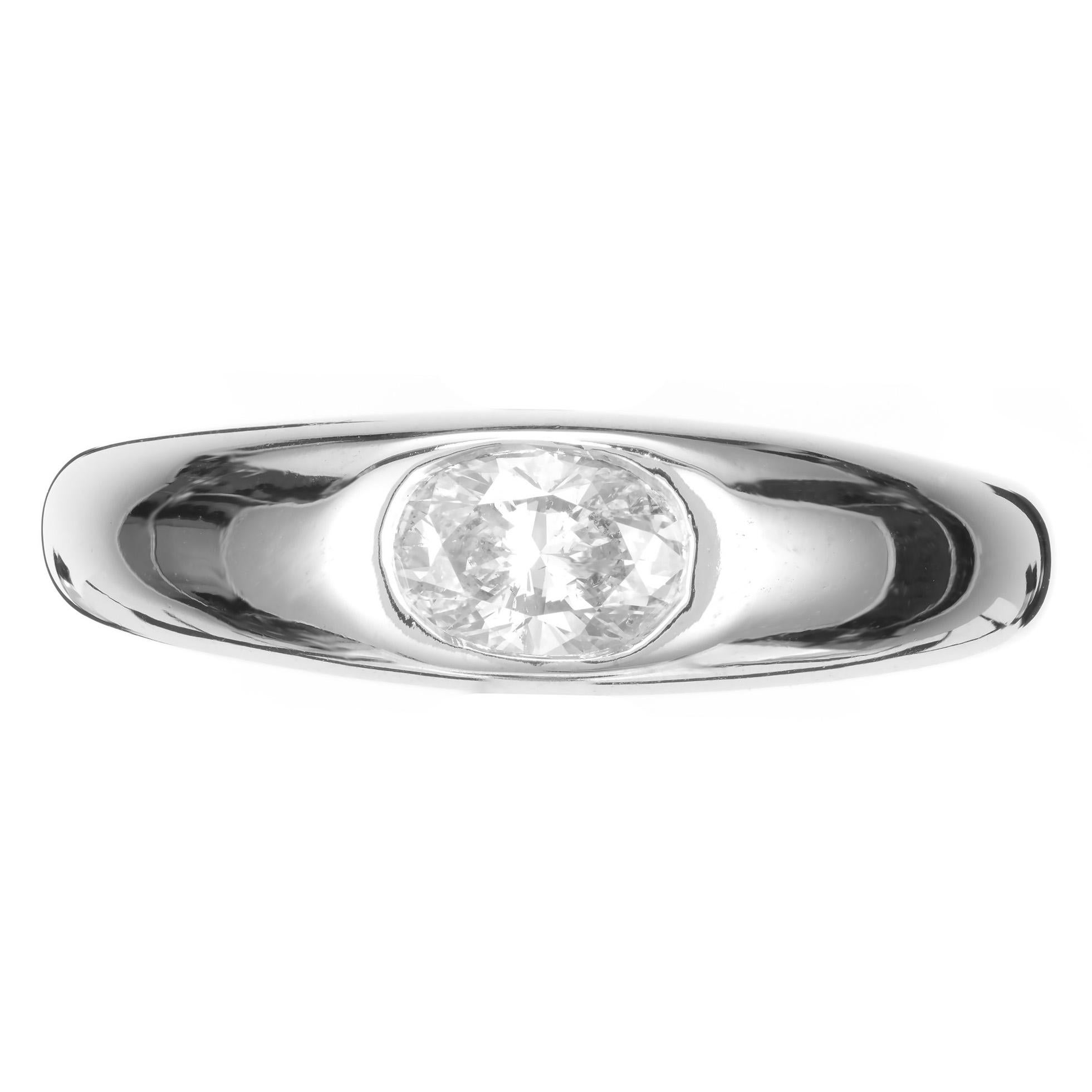 Custom made classic gypsy style diamond unisex ring. Oval cut diamond center stone in a 14k white gold setting. This ring can be made for any size and shape stone, in gold or platinum. Designed and crafted in the Peter Suchy Workshop.

1 oval cut