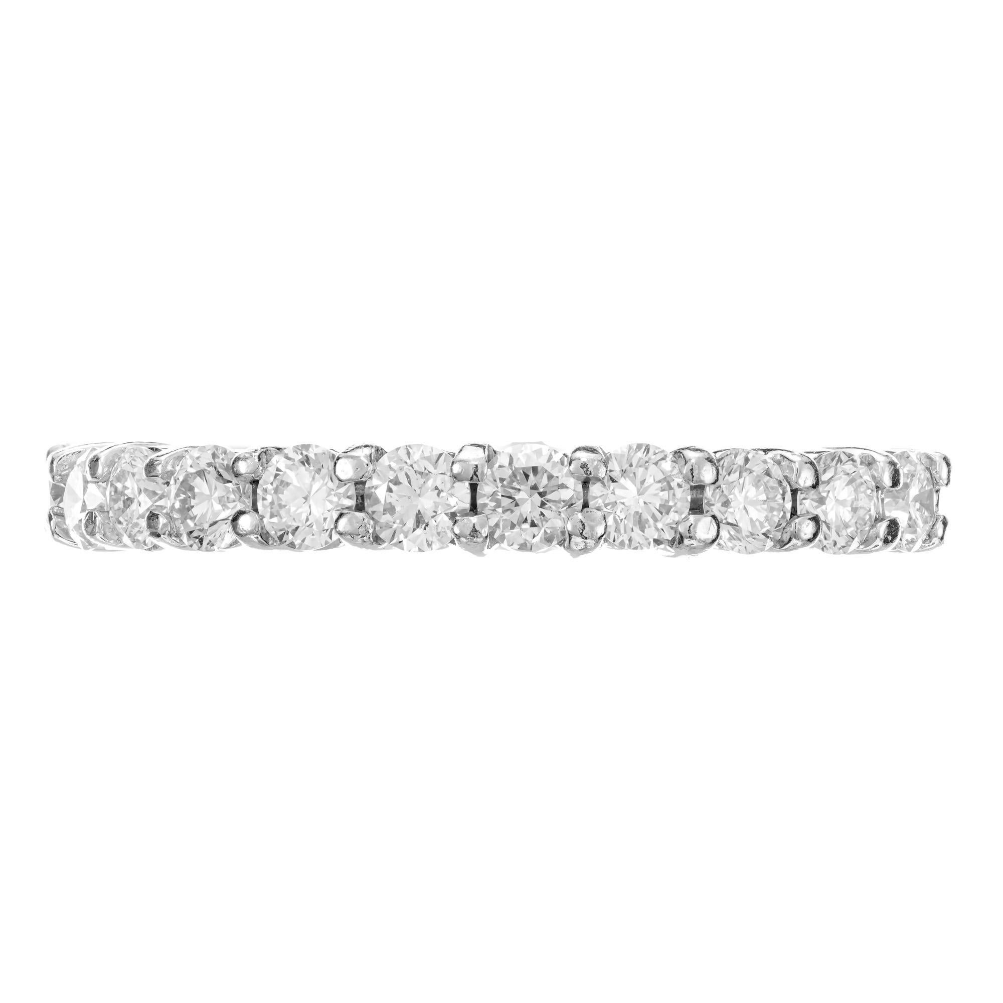 Diamond wedding band ring. Set with 11 round brilliant cut prong set diamonds in a solid platinum setting that was designed and crafted in the Peter Suchy Workshop.

11 round diamonds, G VS approx. .50cts
Size 6 and sizable
Platinum 
Stamped: