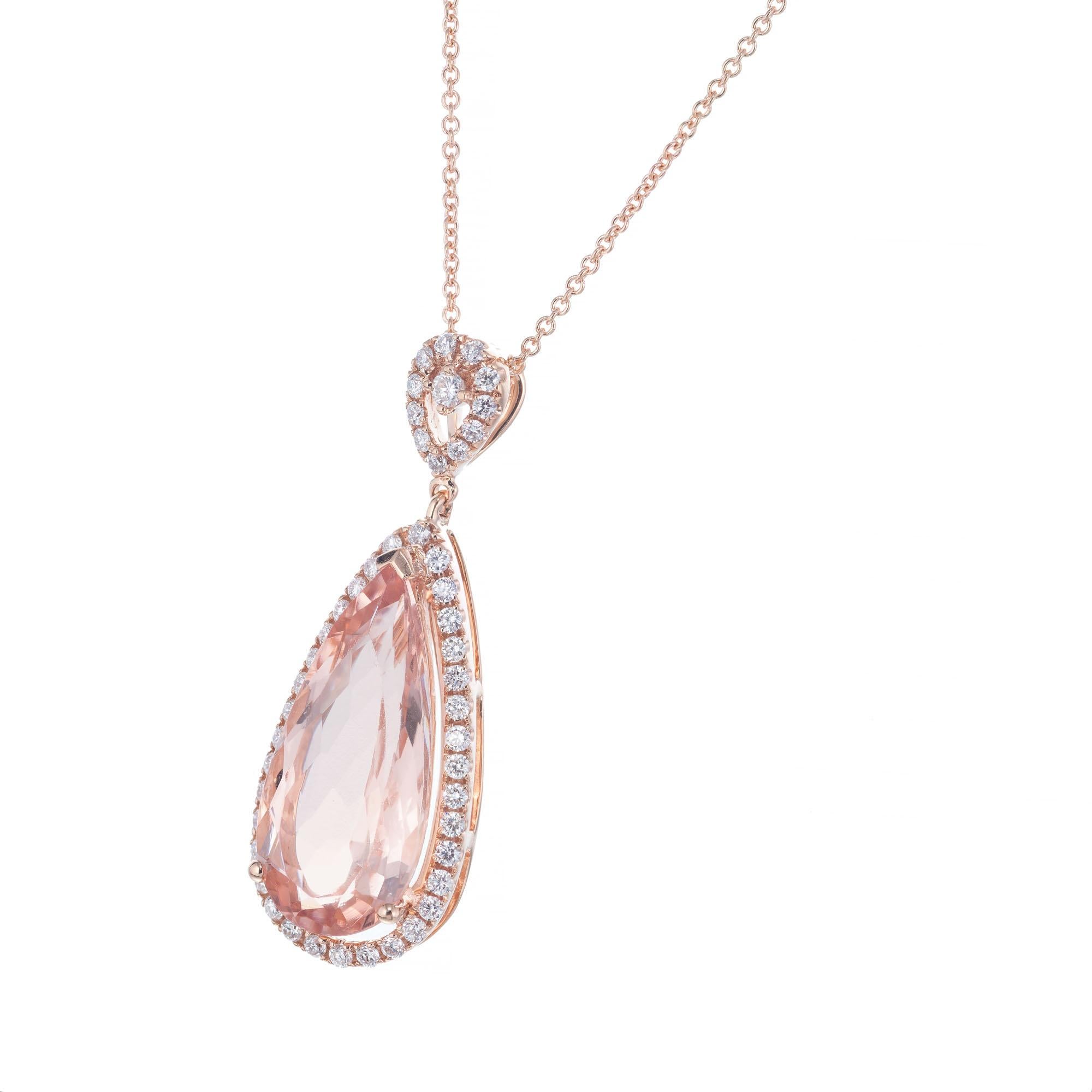 Peter Suchy pear shaped Morganite pendant necklace. 5cts Pear morganite with a diamond halo in a 14k rose gold setting. 18 inch chain. 

1 pear pink Morganite, approx. total weight 5.00cts
47 round diamonds approx. total weight .36cts G-H, VS
14k