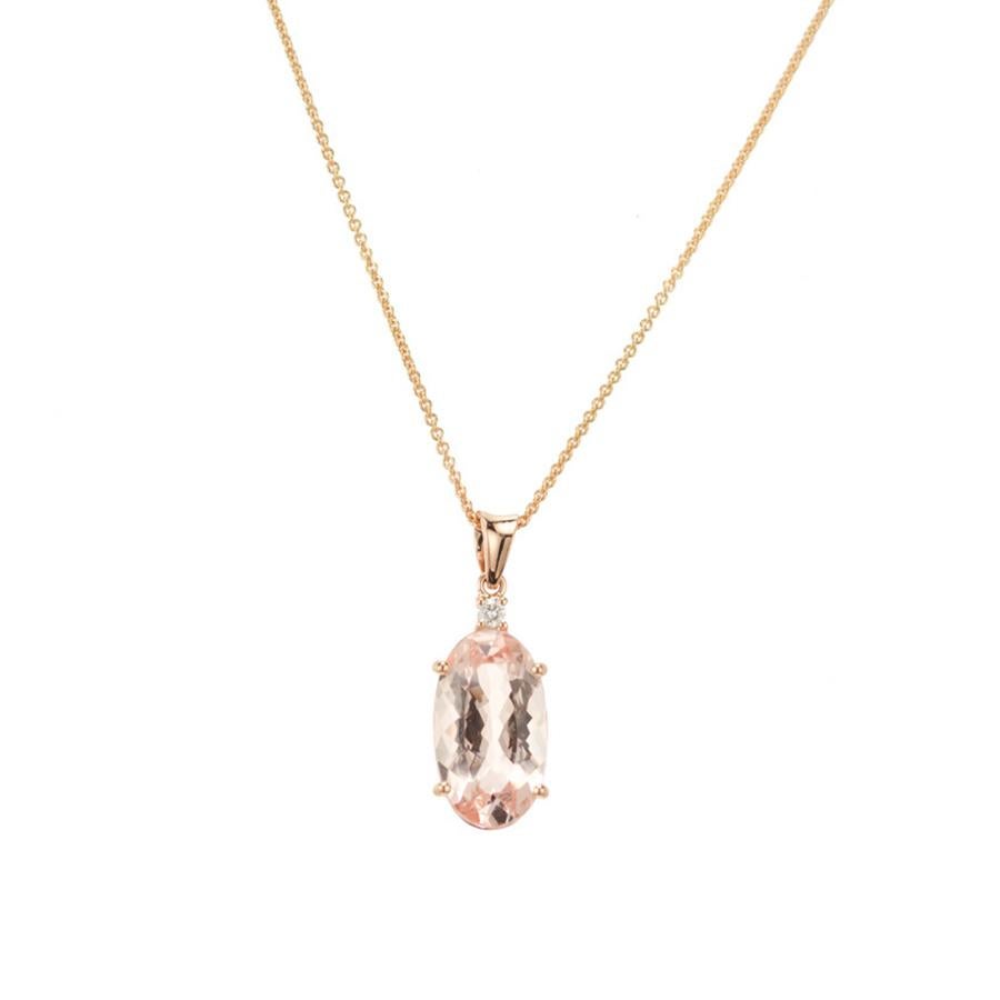 Morganite and diamond pendant necklace. Light and warm 5.04ct oval morganite set in a simple 14k rose gold four prong basket setting enriched with on round cut accent diamond.  16 inch rose gold chain and bail. Created and crafted in the Peter Suchy
