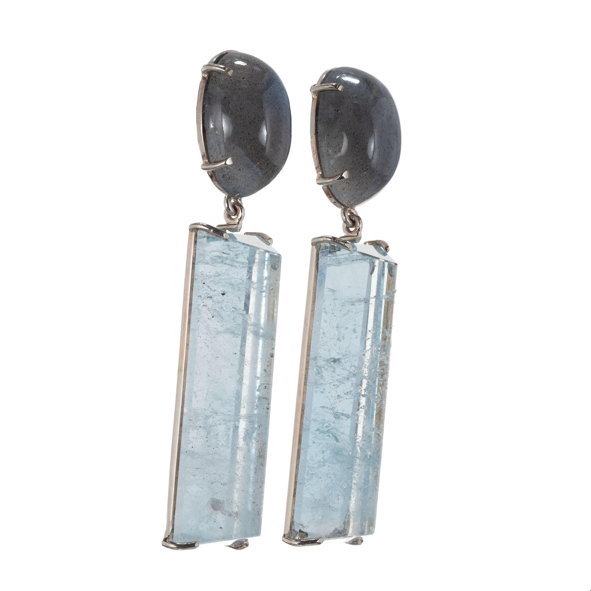 Peter Suchy labradorite and blue topaz dangle earrings handmade in 14k white gold settings. Created in the Peter Suchy Workshop. 

2 oval cabochons gray labradorite I, approx. 12.00cts
2 triangular cylinder blue topaz I, approx. 40.7cts
14k white