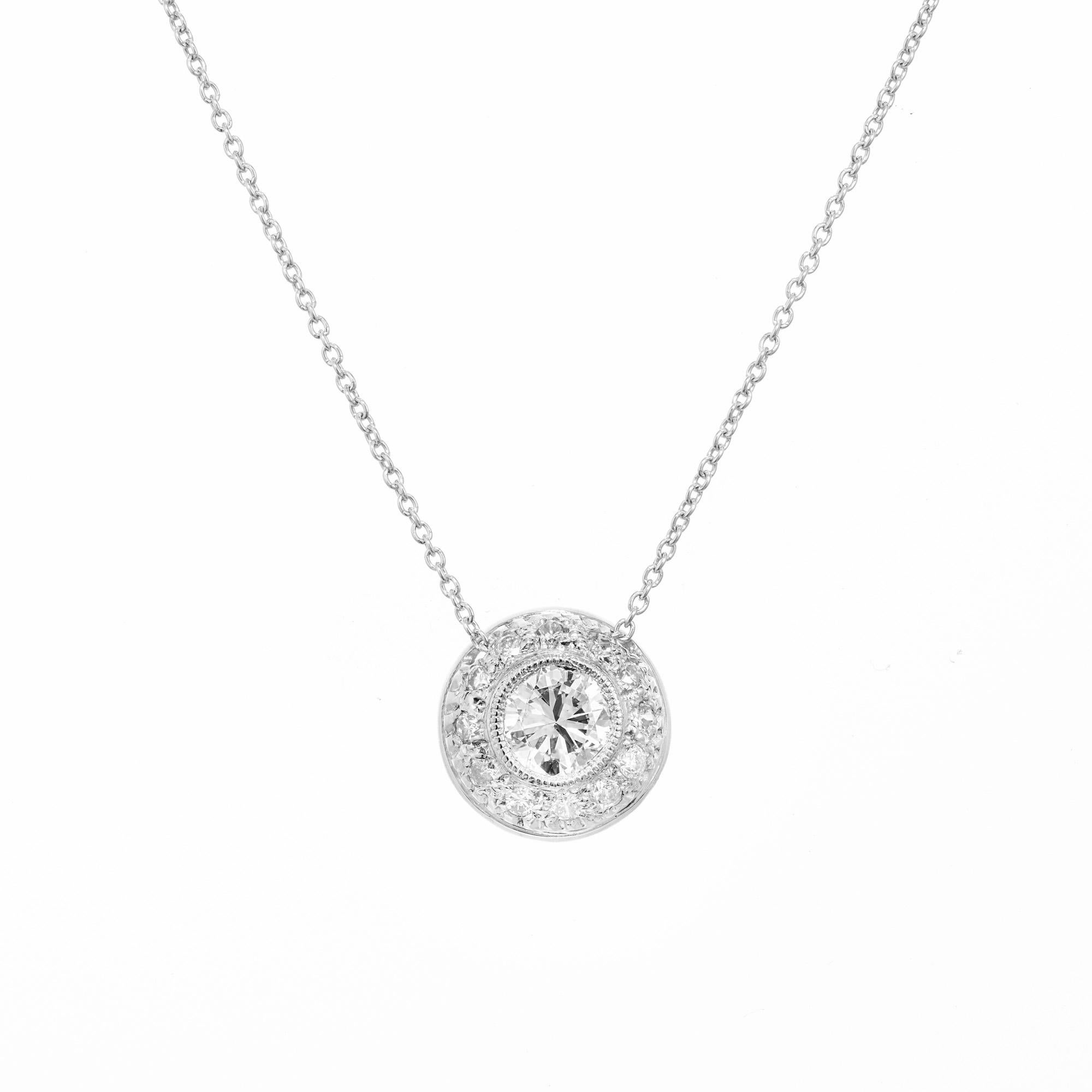 Antique inspired domed round diamond Slide pendant necklace. .53ct round cut center diamond in a mounted platinum beaded bezel slide setting. Accented with 12 round pave set diamonds. 18 inch platinum chain. Designed and crafted in the Peter Suchy