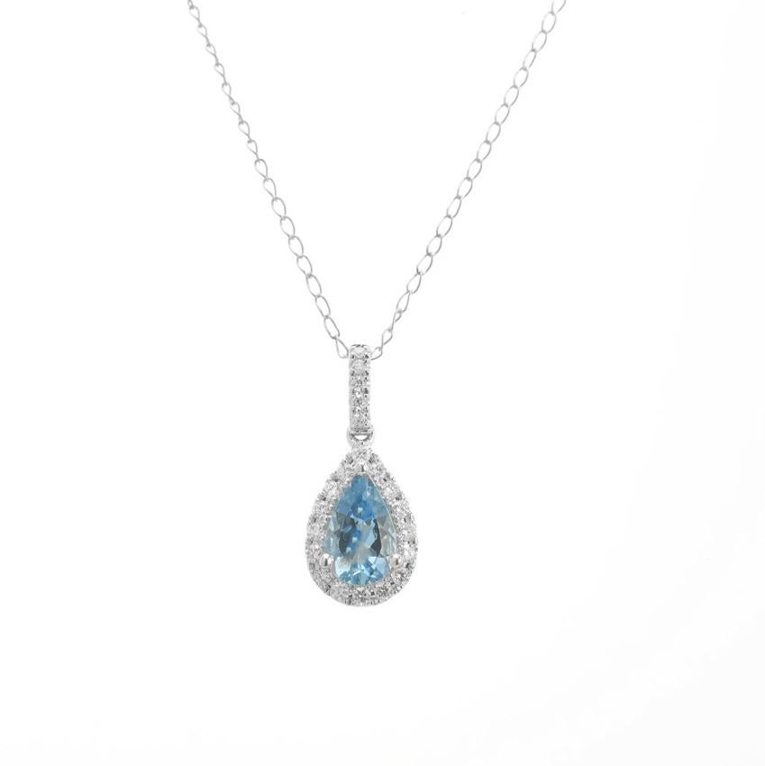 Aquamarine and diamond pendant necklace. .54ct pear shape aqua with a halo of 21 round cut diamonds set in a 14k white gold setting. 16 inch 14k white gold chain. Created in the Peter Suchy Workshop. 

1 pear shaped aquamarine, approx. total total