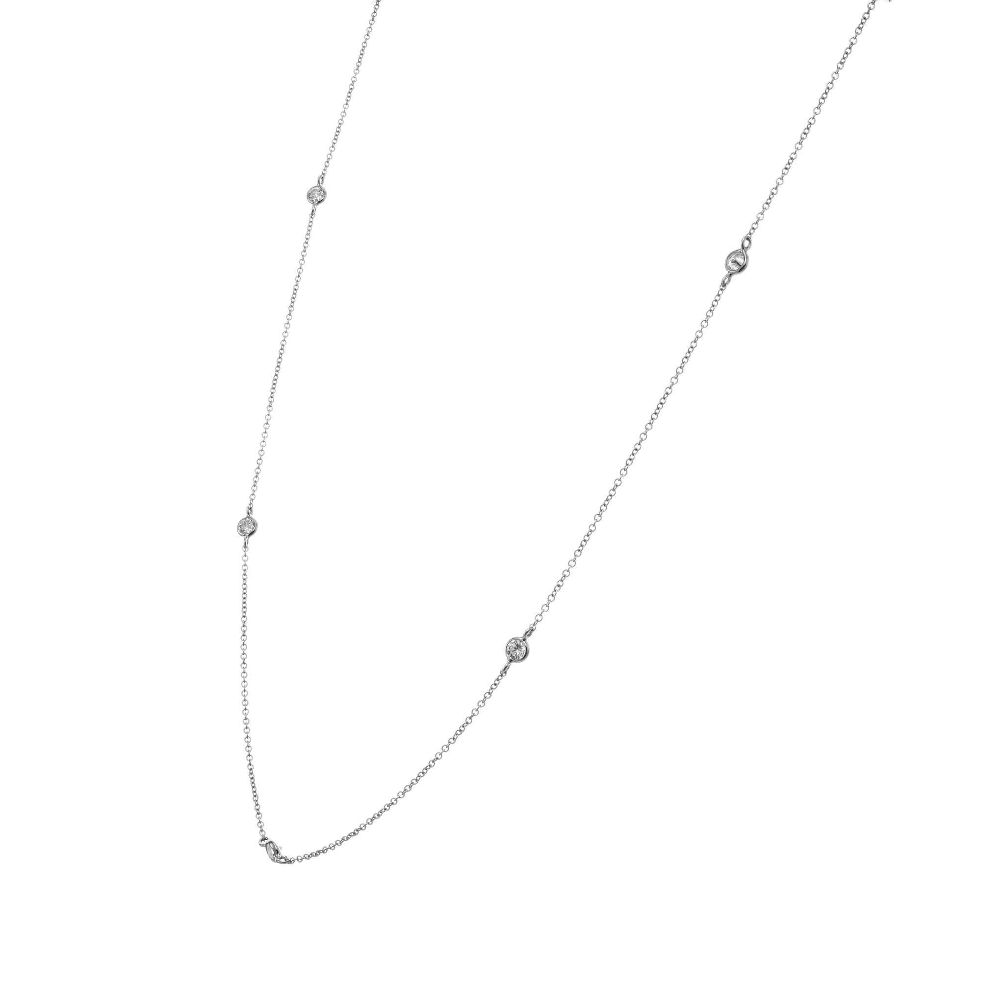 Five diamond .55 carat brilliant cut diamond by the yard 14k white gold necklace. 16.5 inches. 

5 round brilliant cut diamonds, G-H VS-SI approx. .55cts
14k White Gold 
Stamped: 14k 
1.6 grams
Chain: 16.5 Inches
Width: 3.5mm 

