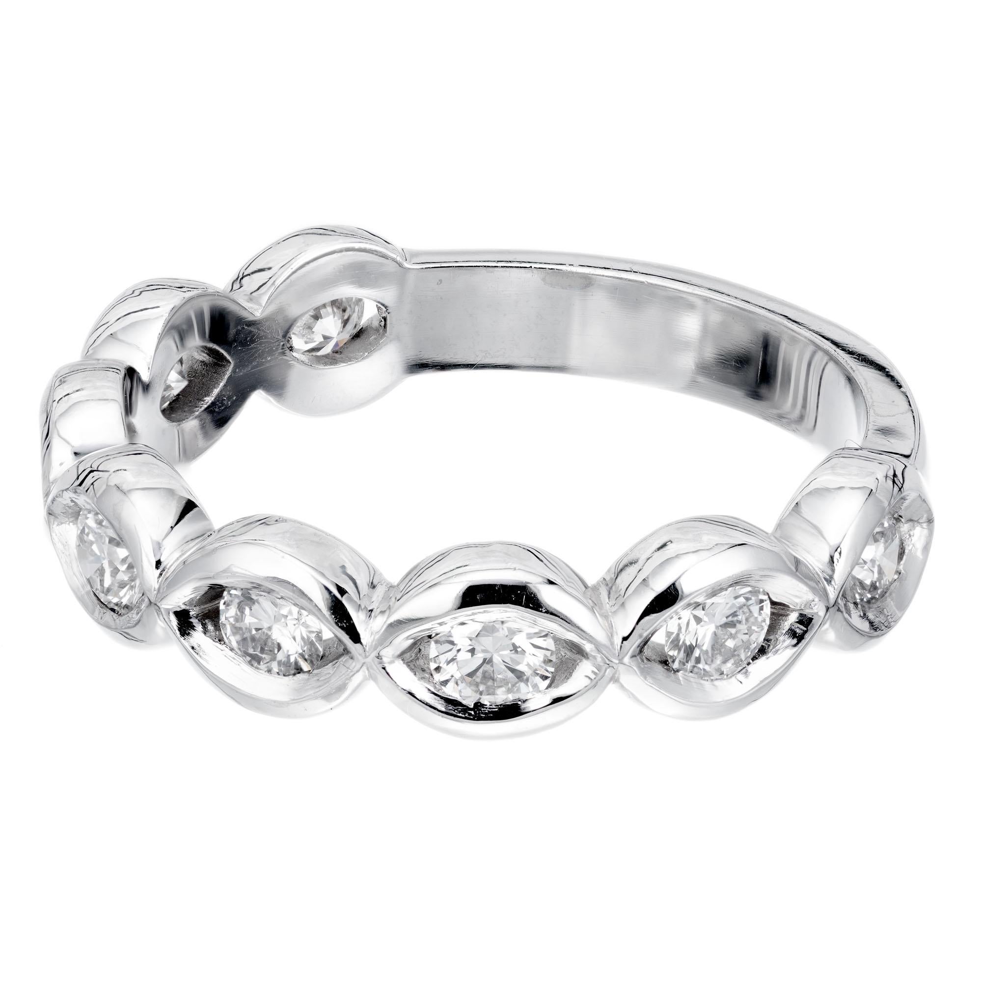 Infinity design diamond swirl wedding band. 8 Ideal full cut Diamonds in a platinum swirl design setting. The Diamonds go ¾ of the way around to allow for sizing and wear. Created in the Peter Suchy Workshop.

8 round Ideal brilliant cut Diamonds,