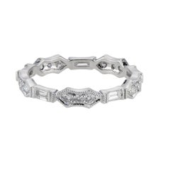 Anillo de boda de platino con diamantes de Peter Suchy de 0,60