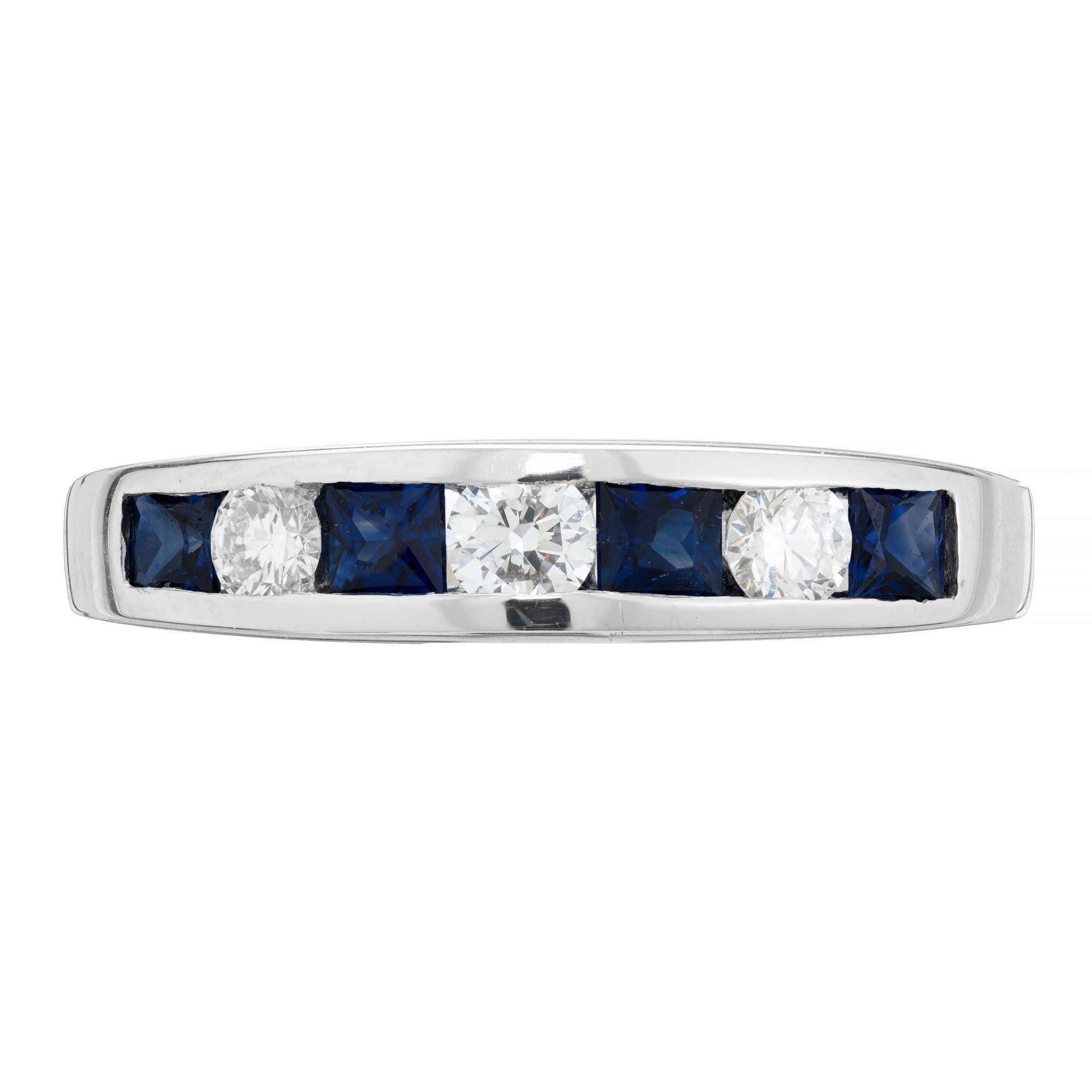 Simple channel set Sapphire and diamond wedding band ring. 4 square cut sapphires alternating with 3 round brilliant cut diamonds in a platinum setting. Designed and crafted in the Peter Suchy Workshop.

3 round brilliant cut diamonds, G VS approx.