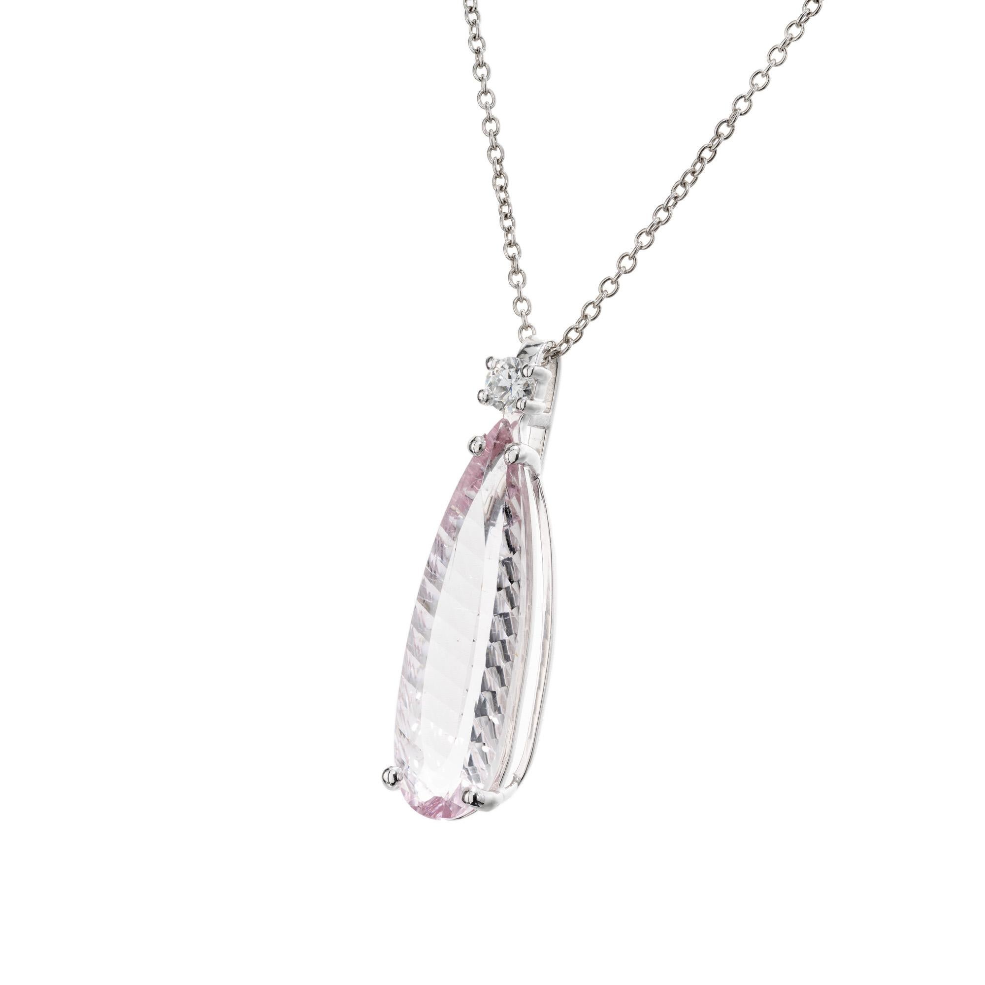 Exquisite Peter Suchy 6.56 Carat baby pink fantasy cut Tourmaline Diamond Platinum Pendant Necklace. This pendant necklace showcases a magnificent 6.56 carat tourmaline, radiating a captivating hue. Accented with a round brilliant cut diamond. The