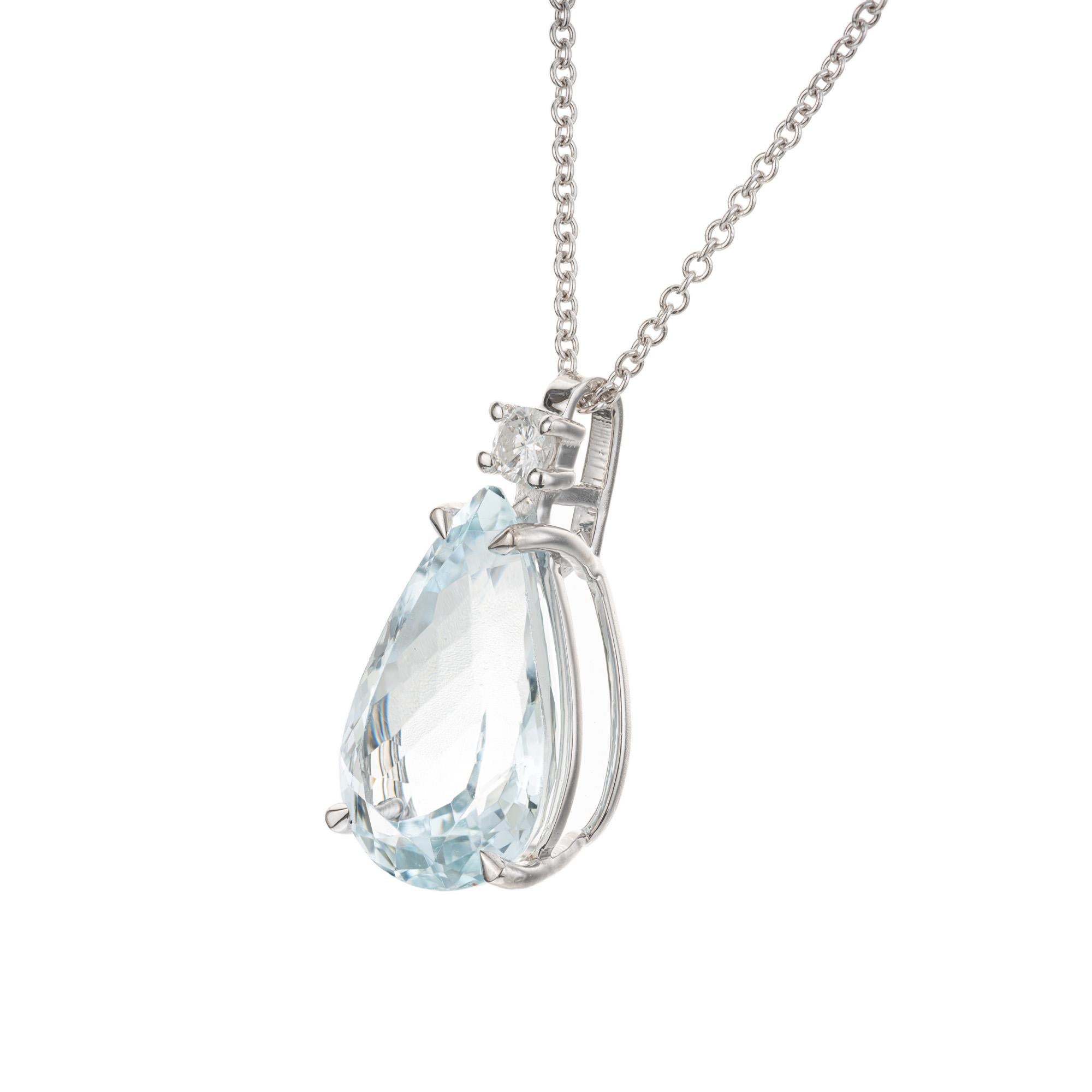 This pendant necklace features a mesmerizing 6.98 carat pear shaped aquamarine gemstone that is set in a 14k white gold four prong setting which is accented by a round brilliant cut diamond. The Aqua has a serene and calming blue hue. The setting