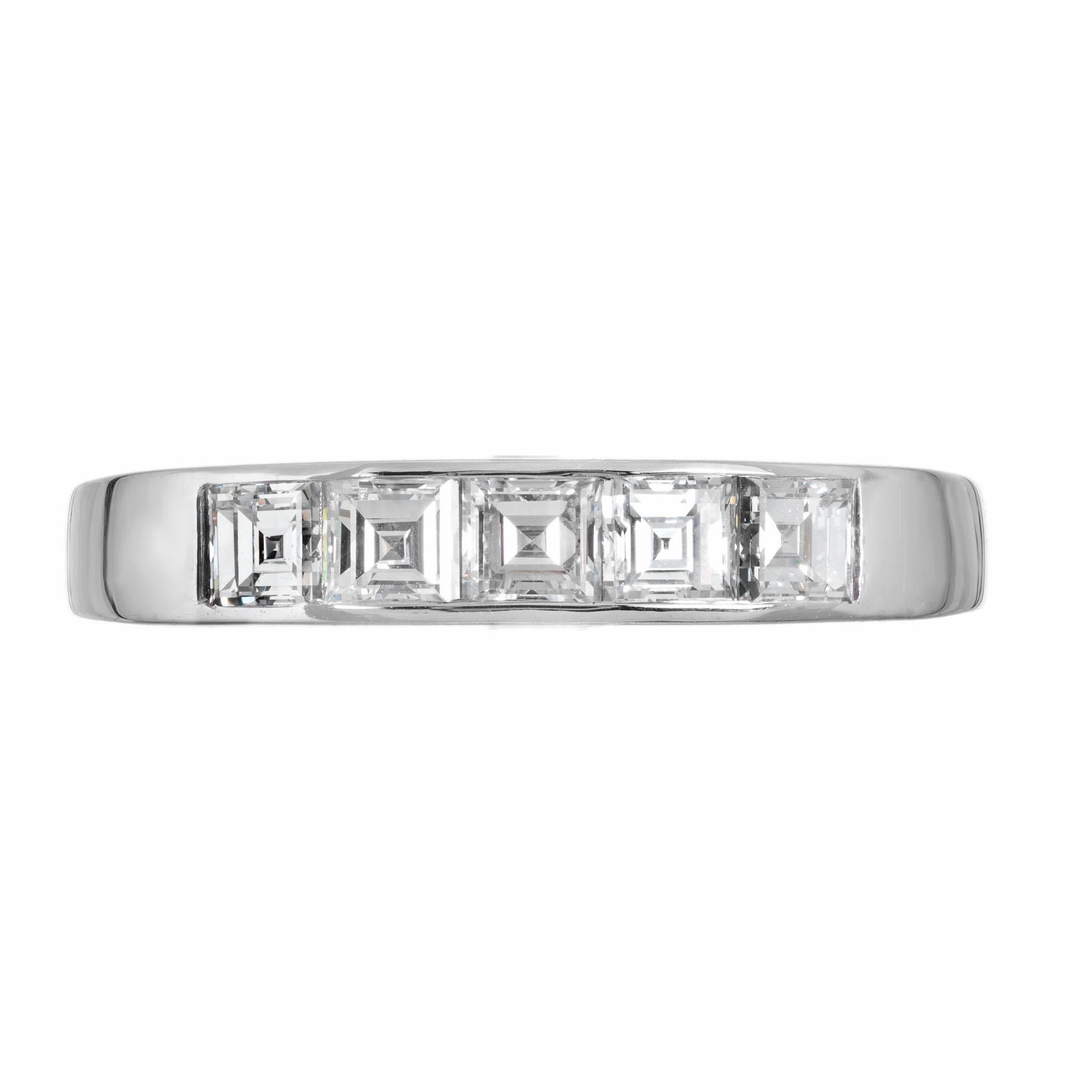Art Deco 1920’s square step cut diamond wedding band ring.  .70 carat square cut channel set diamonds in a platinum setting. Created in the Peter Suchy workshop. 

5 square cut diamonds G VS, approx. .70ct
Size: 5.75 and sizable
Platinum 
Stamped: