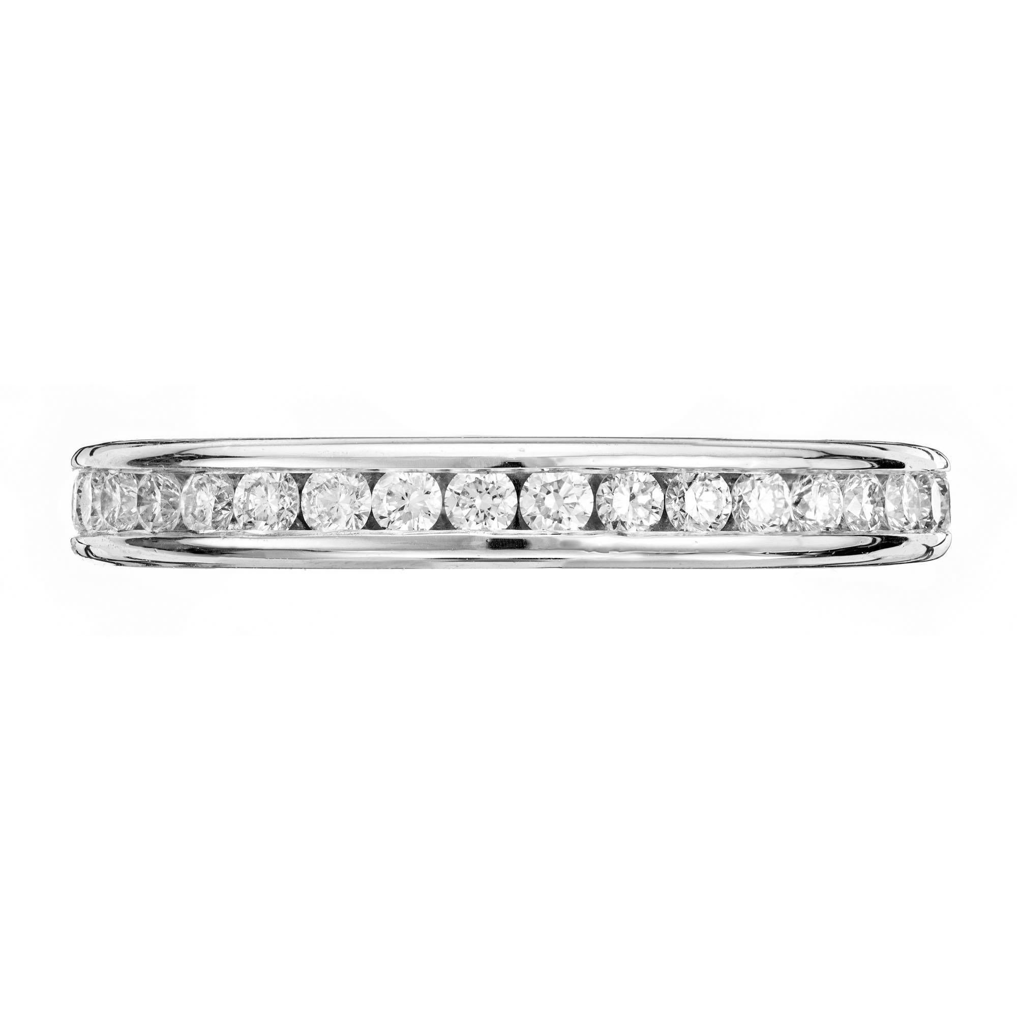 Channel set diamond wedding eternity band. 37 bright round brilliant cut diamonds. Can be custom ordered in different sizes. Designed and crafted in the Peter Suchy workshop

37 round brilliant cut diamonds, VS approx. .74cts
Size 7.5 and not