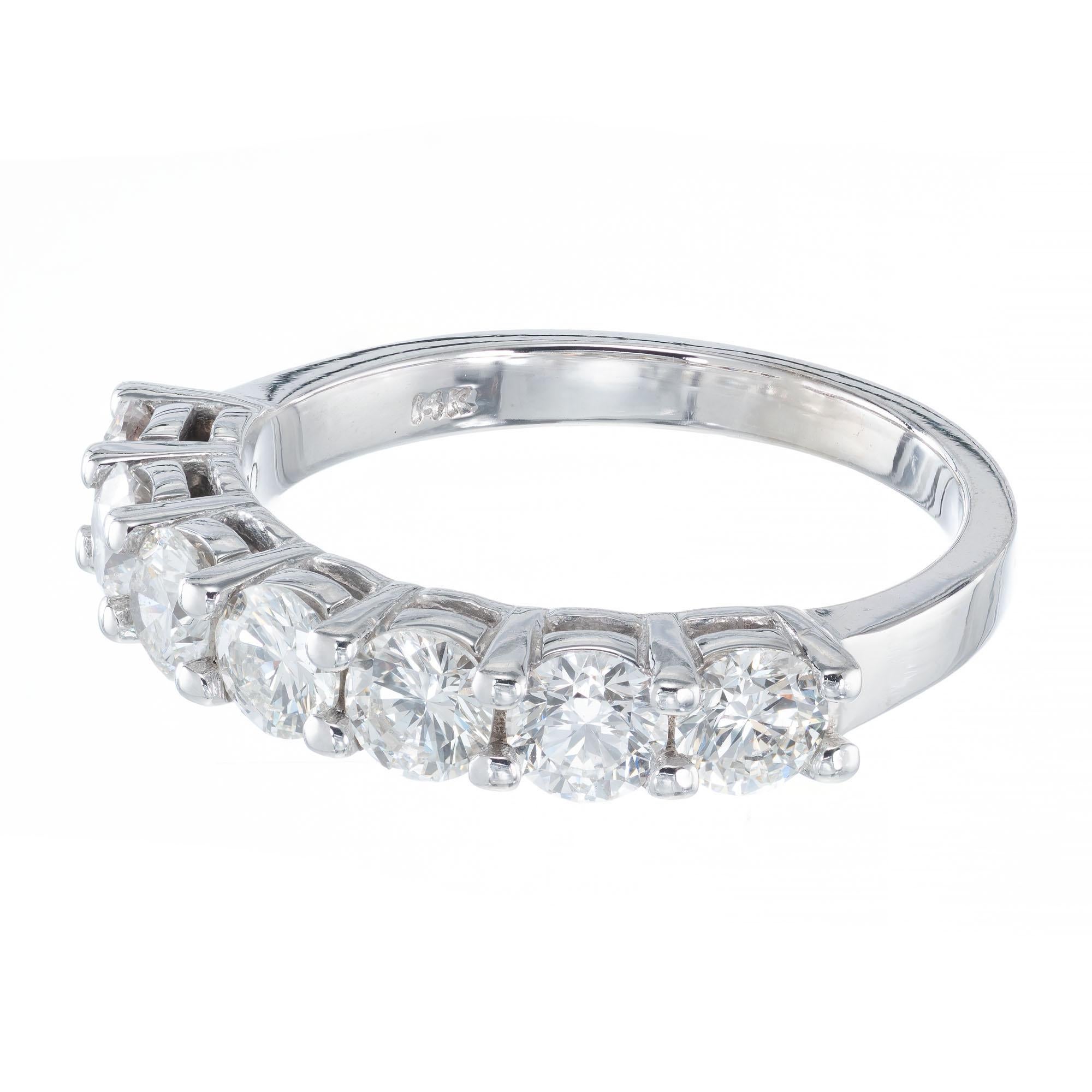 7 round Diamond wedding band in a classic custom prong platinum setting from the Peter Suchy Workshop.

7 round brilliant cut diamonds G-H, VS-SI, approx. 1.20cts
Size 6.5 and sizable 
Platinum 
Stamped: PLAT
4.6 grams
Width at top: 3.0mm
Height at