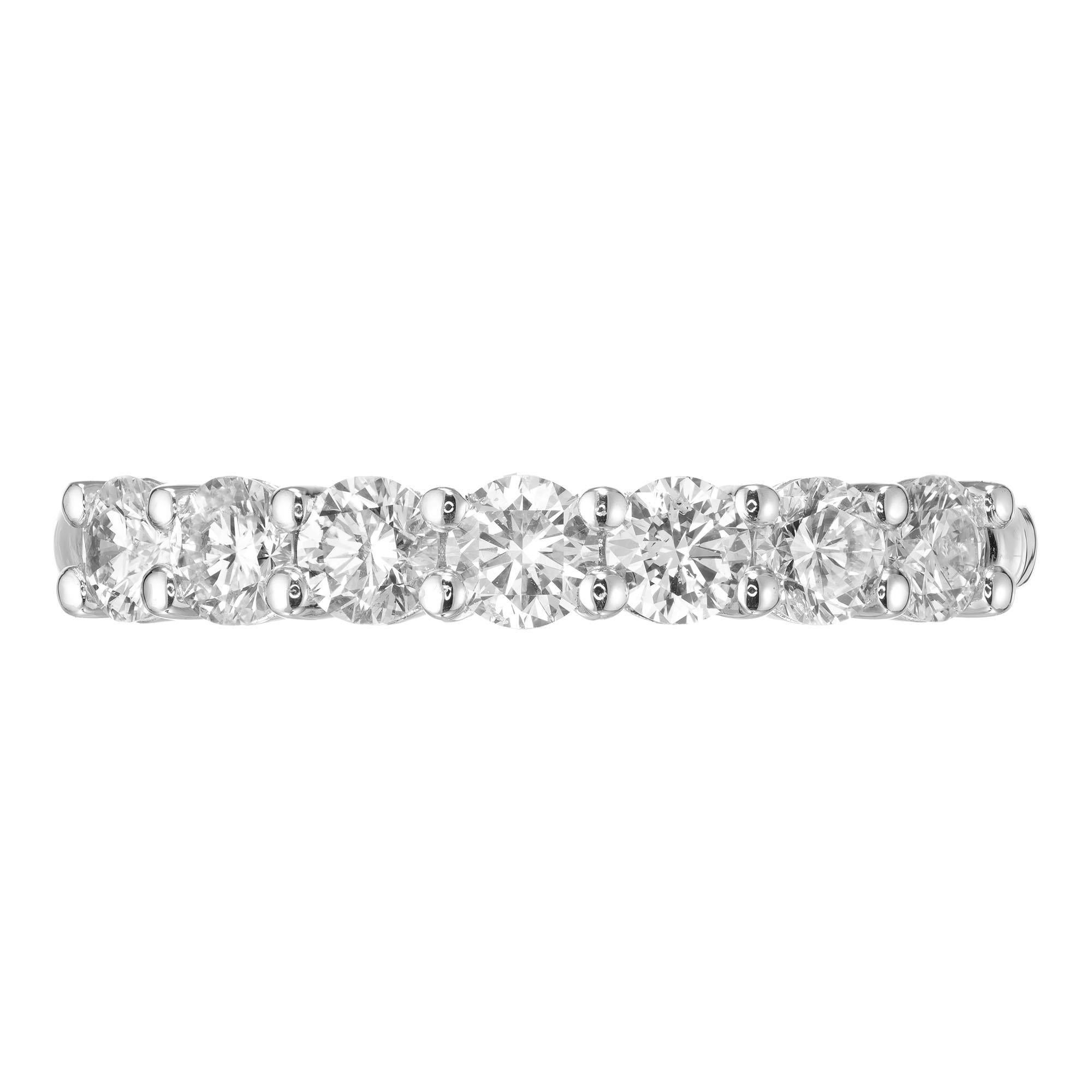 Peter Suchy seven diamond platinum wedding band ring. 

7 round brilliant cut diamonds, G-H VS-SI approx. .74cts
Size 6 and sizable 
Platinum 
Stamped: PLAT 
4.6 grams
Width at top: 3.0mm
Height at top: 3.2mm
Width at bottom: 2.0mm

