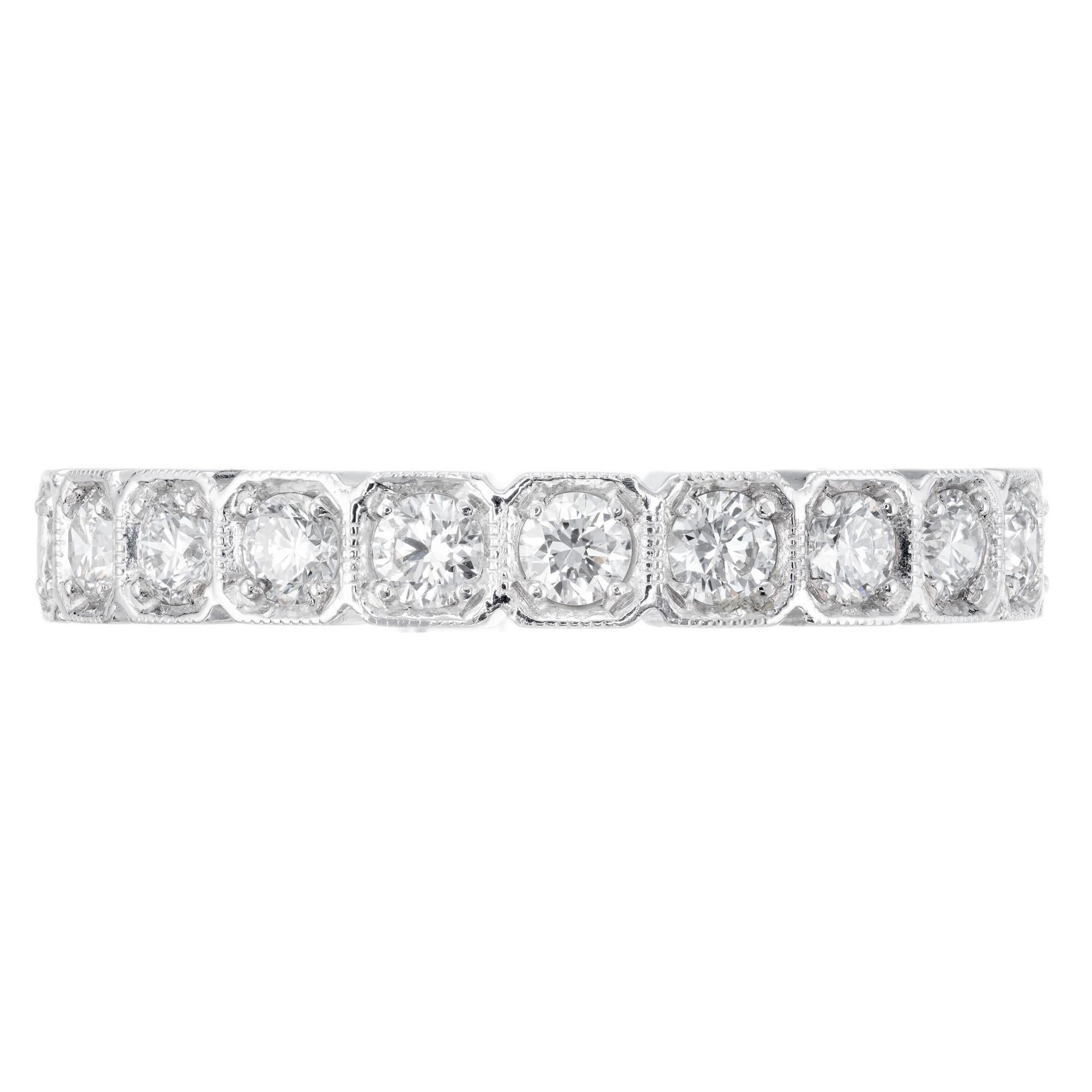 15 round diamond wedding band ring in Platinum. 1920's Art Deco style design, created in the Peter Suchy Workshop.

15 round brilliant cut diamonds, approx. total weight .75cts, F, VS
Size 6 1/2 and sizable
Platinum
Stamped: Plat
6.3 grams
Width at