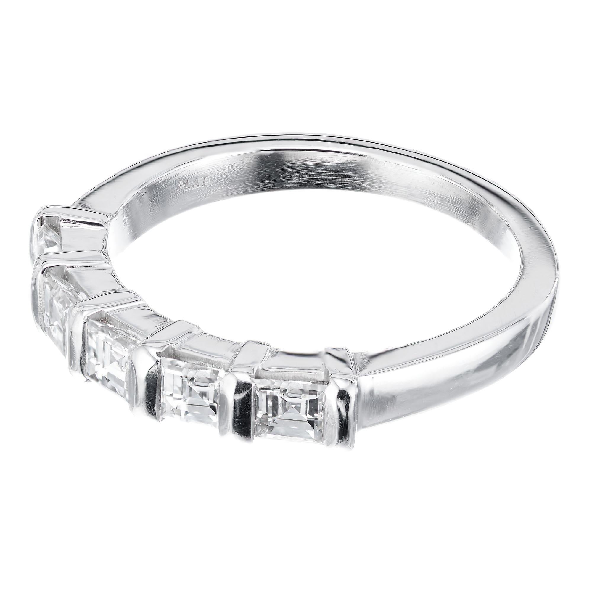 Square step cut 5 diamond simple strong bar set wedding band, in platinum.  Made in the Peter Suchy Workshop.

5 square emerald step cut diamonds G, VS approx. .76ct
Size 6 and sizable
Platinum 
Stamped: PLAT
5.4 grams
Width at top: 3.48mm
Height at