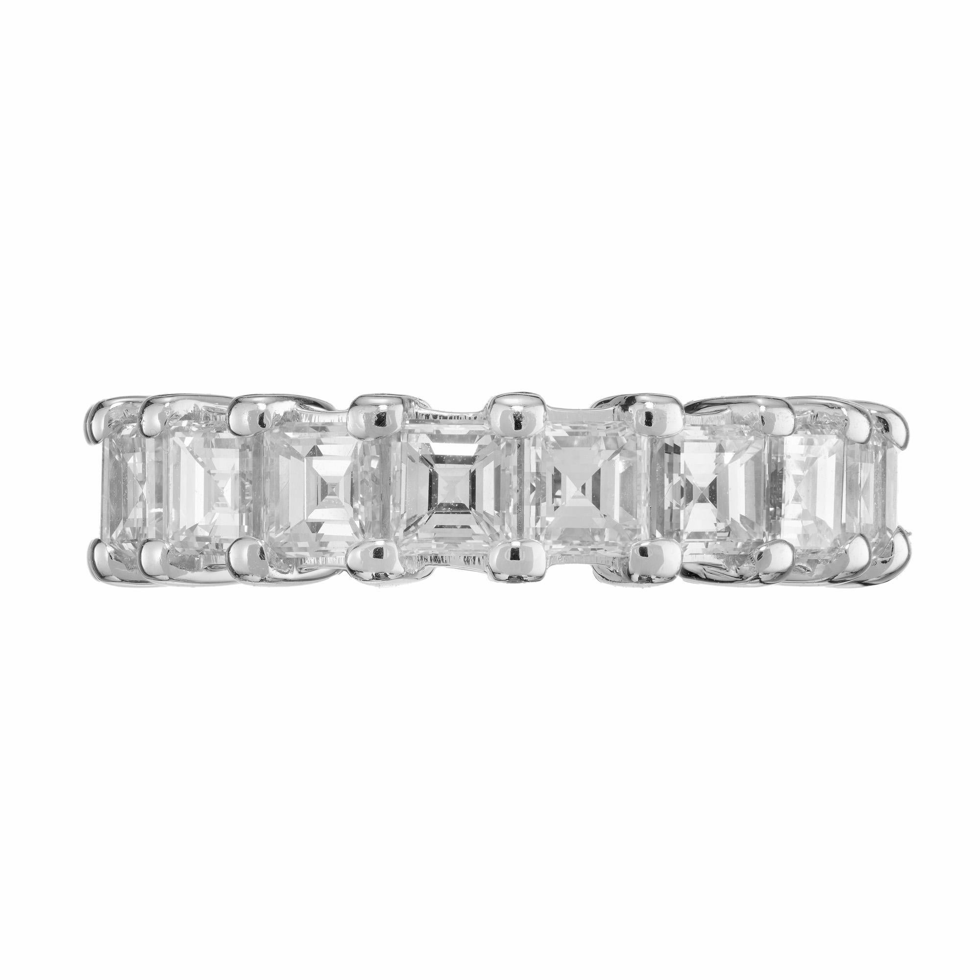 Beautiful square step cut diamond wedding band ring. Adorned with 18 diamonds with an approximate total weight of 7.74cts. The diamonds are bright with 1920's style step cutting, G color-solid white, VS clarity- very slight inclusions difficult to