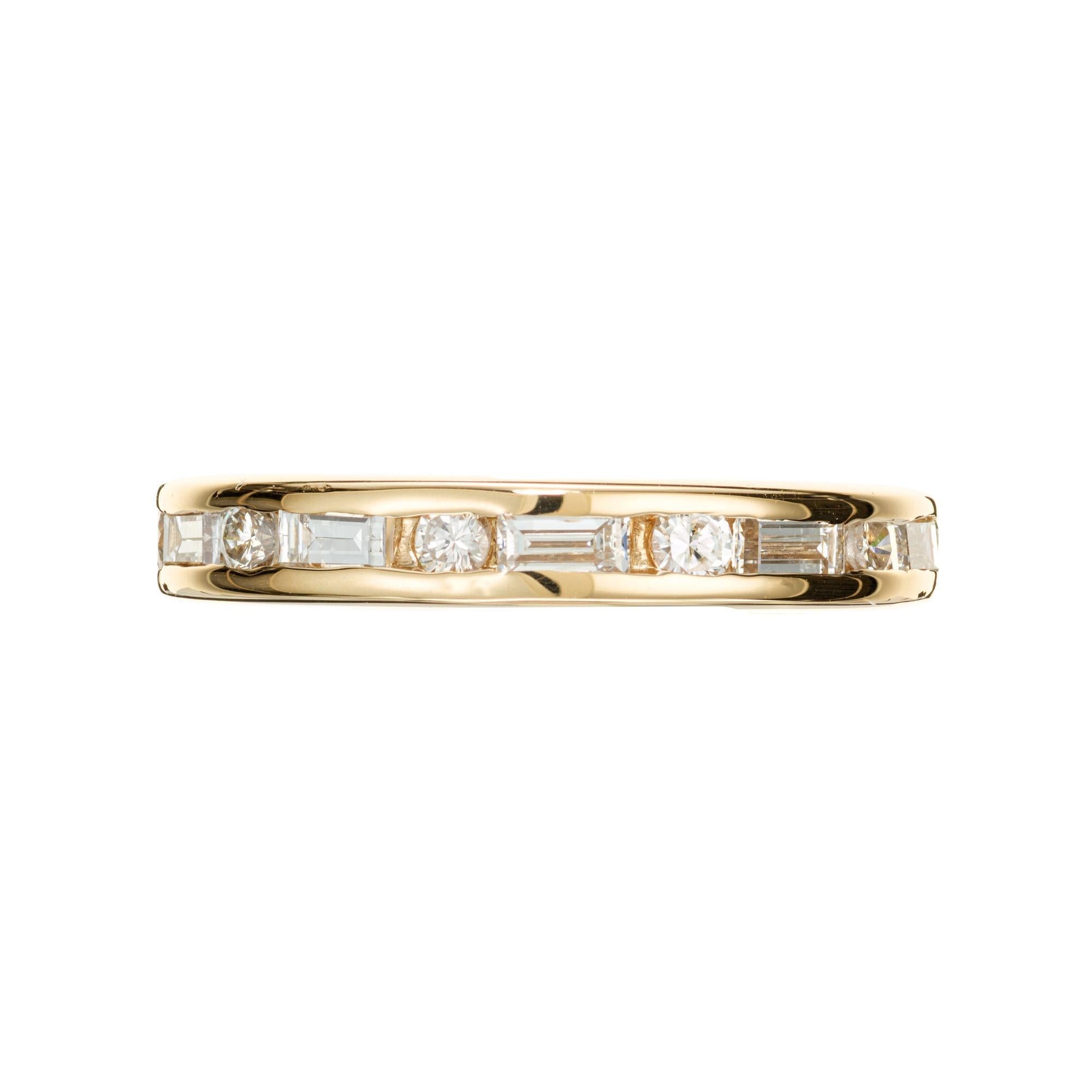 Custom made 14k yellow gold classic channel set wedding band set with round and baguette diamonds. Can be ordered in any metal and size. Designed and crafted in the Peter Suchy workshop

10 baguette diamonds, approx. .40cts
10 round brilliant cut