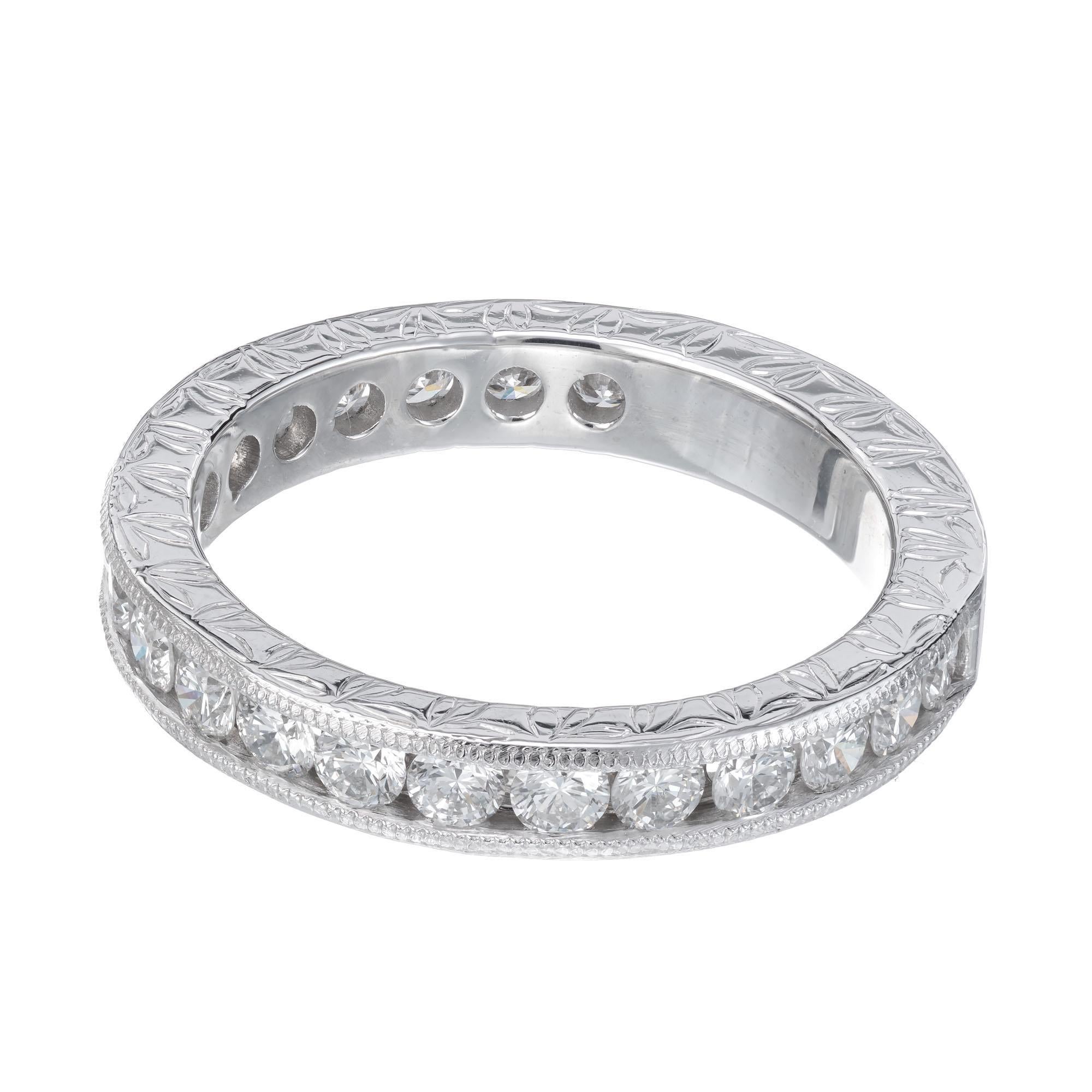 Antique Inspired diamond wedding band. 34 round brilliant cut diamonds in a platinum engraved setting with channel set diamonds and millgrain edge. Designed and crafted in the Peter Suchy workshop. This ring can be made in any size, stone size or
