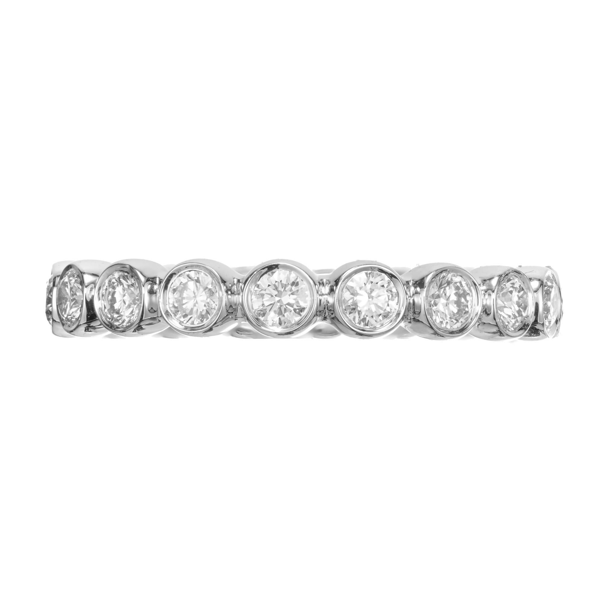 Custom made bubble style platinum diamond eternity band. Set with 18 round brilliant cut diamonds in a platinum bubble setting, designed and crafted in the Peter Suchy Workshop. This ring is not sizable but can be made into any finger or diamond