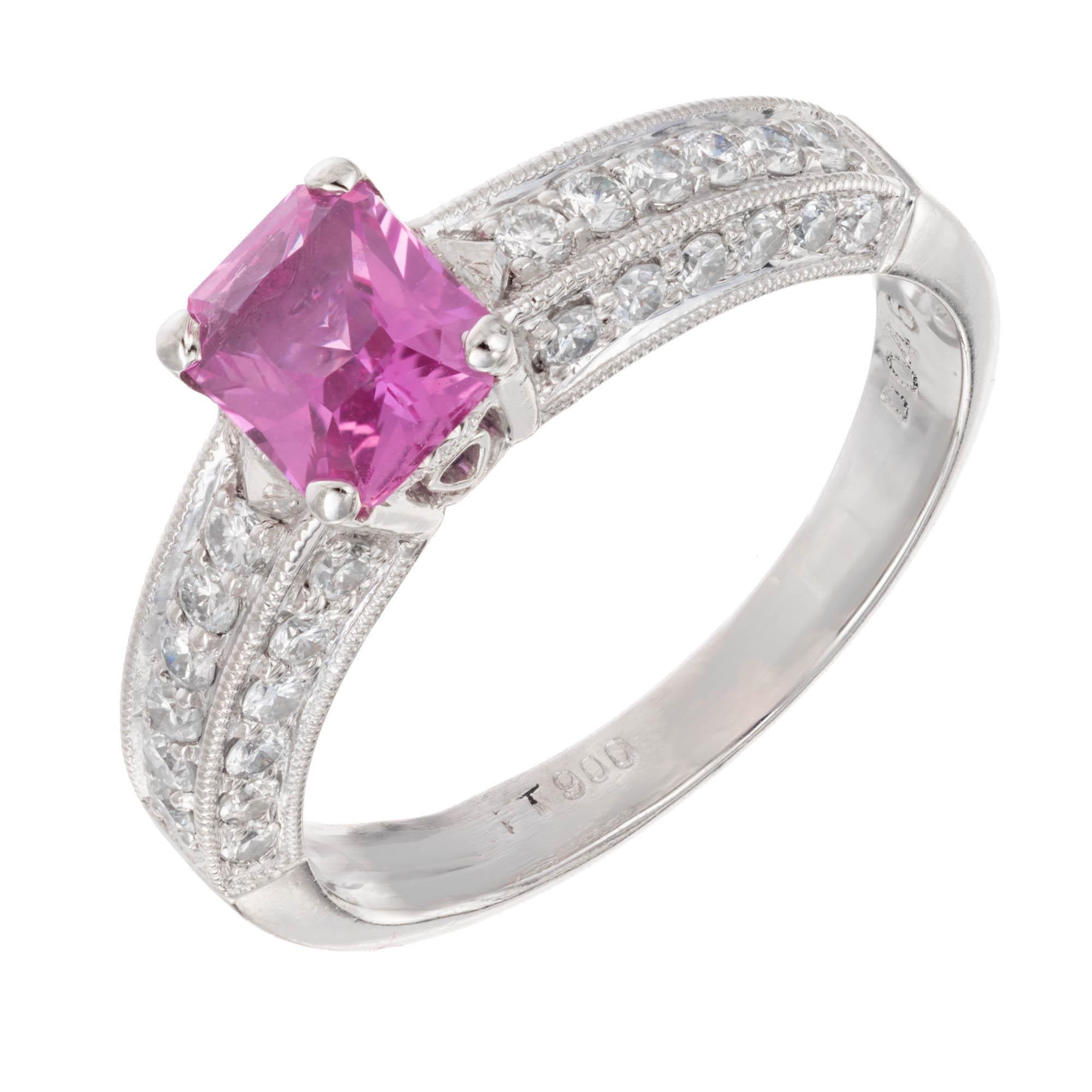 Peter Suchy Emerald Cut Pink Sapphire and diamond engagement ring. 1930’s bright pink GIA Certified natural sapphire in a platinum setting with round accent diamonds. Created by the Peter Suchy Workshop

1 octagonal pink SI sapphire, Approximate .93