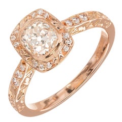 Verlobungsring aus Roségold mit .96 Karat Diamant-Halo von Peter Suchy